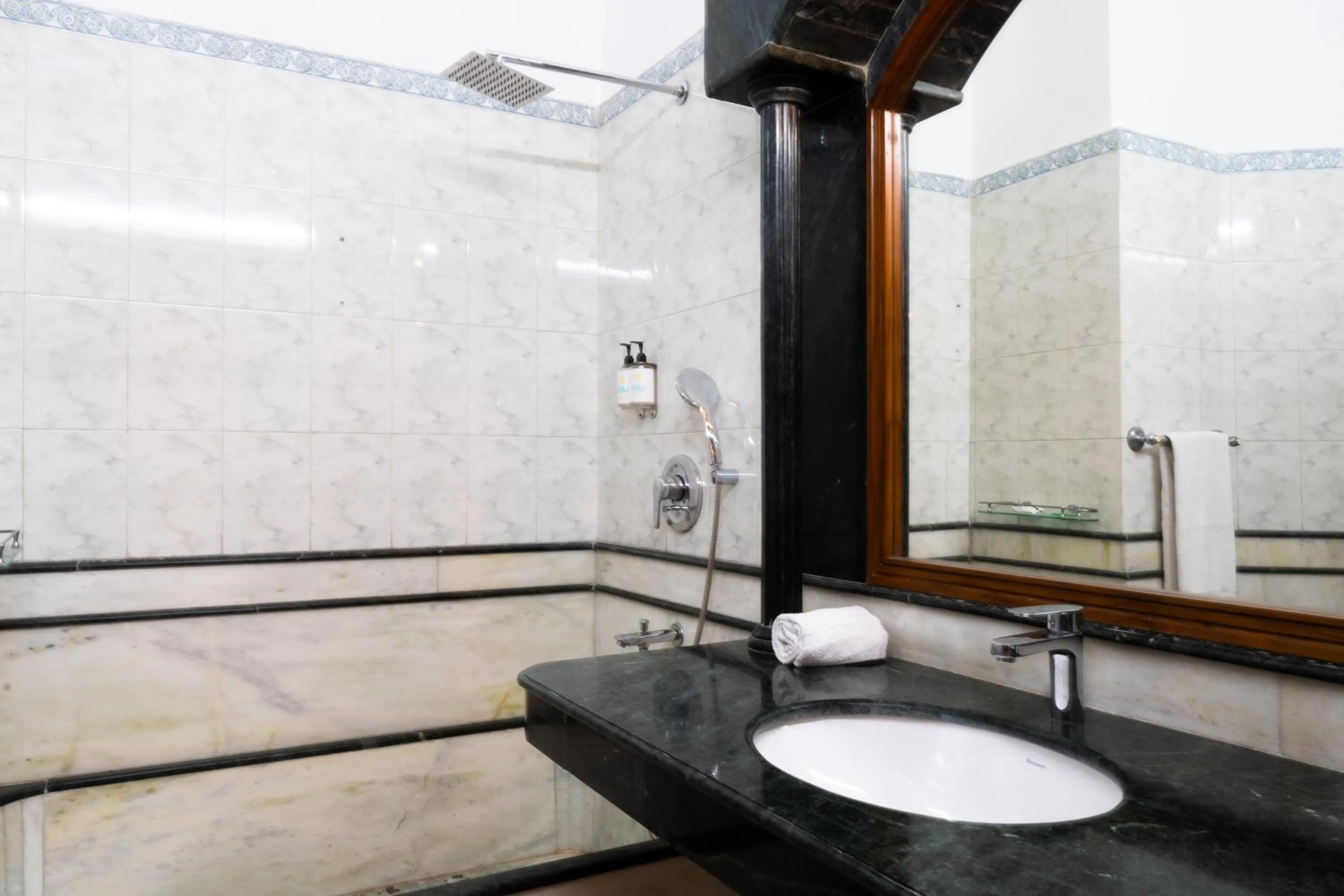Bathroom in Hotel Bluestone Prime Nehru Place by The Cosy hotels