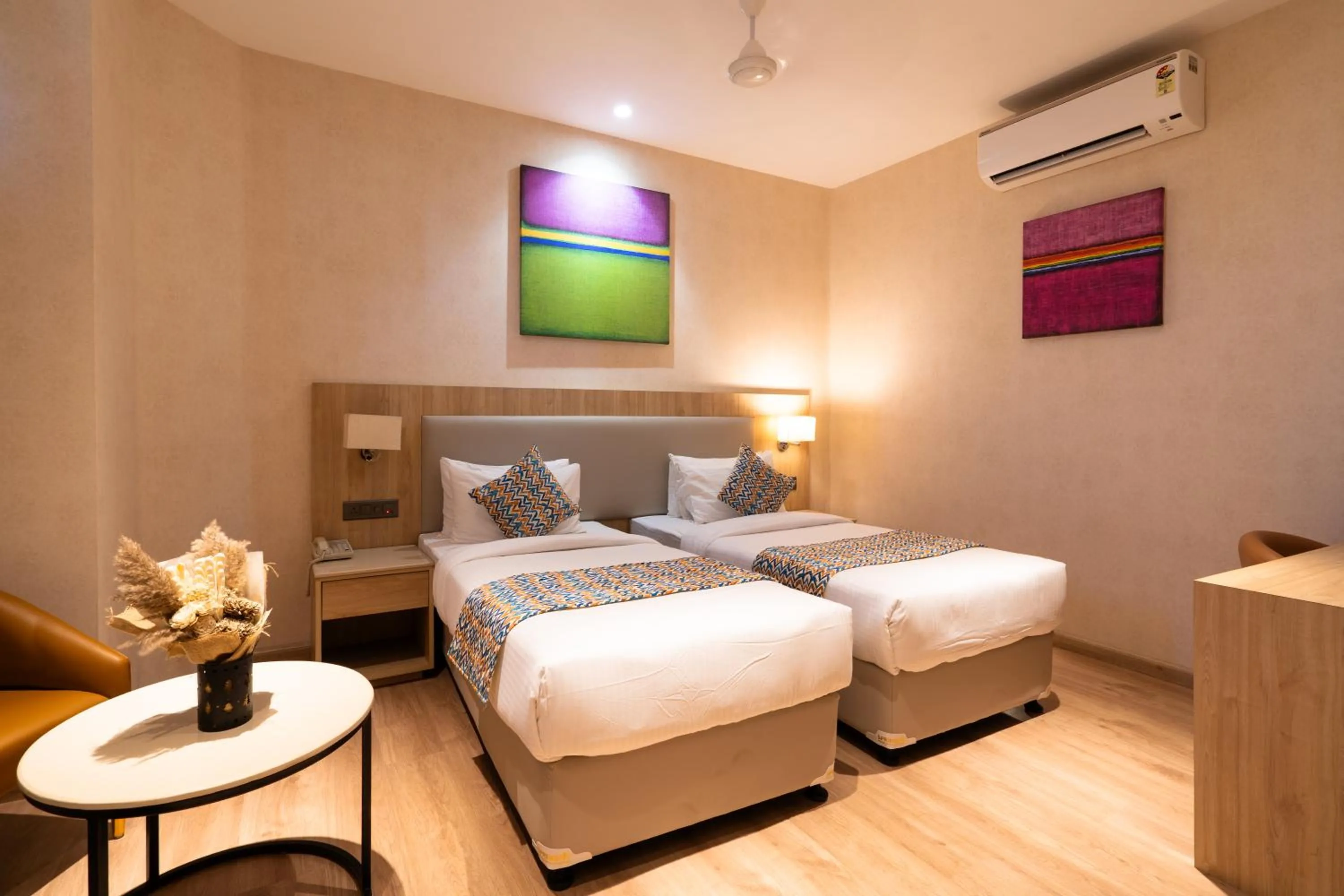 Photo of the whole room, Bed in Hotel Bluestone Prime Nehru Place by The Cosy hotels
