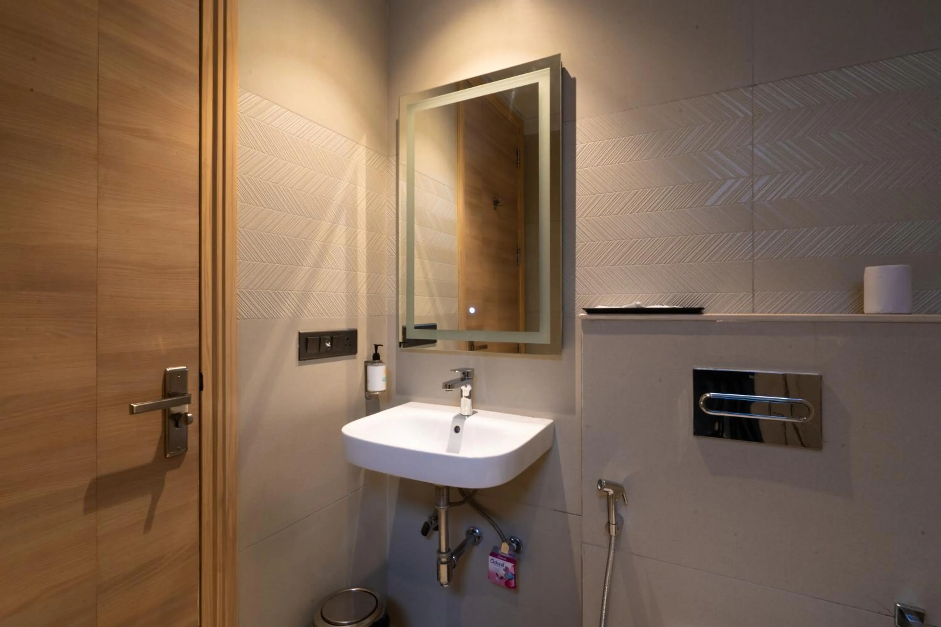 Bathroom in Hotel Bluestone Prime Nehru Place by The Cosy hotels