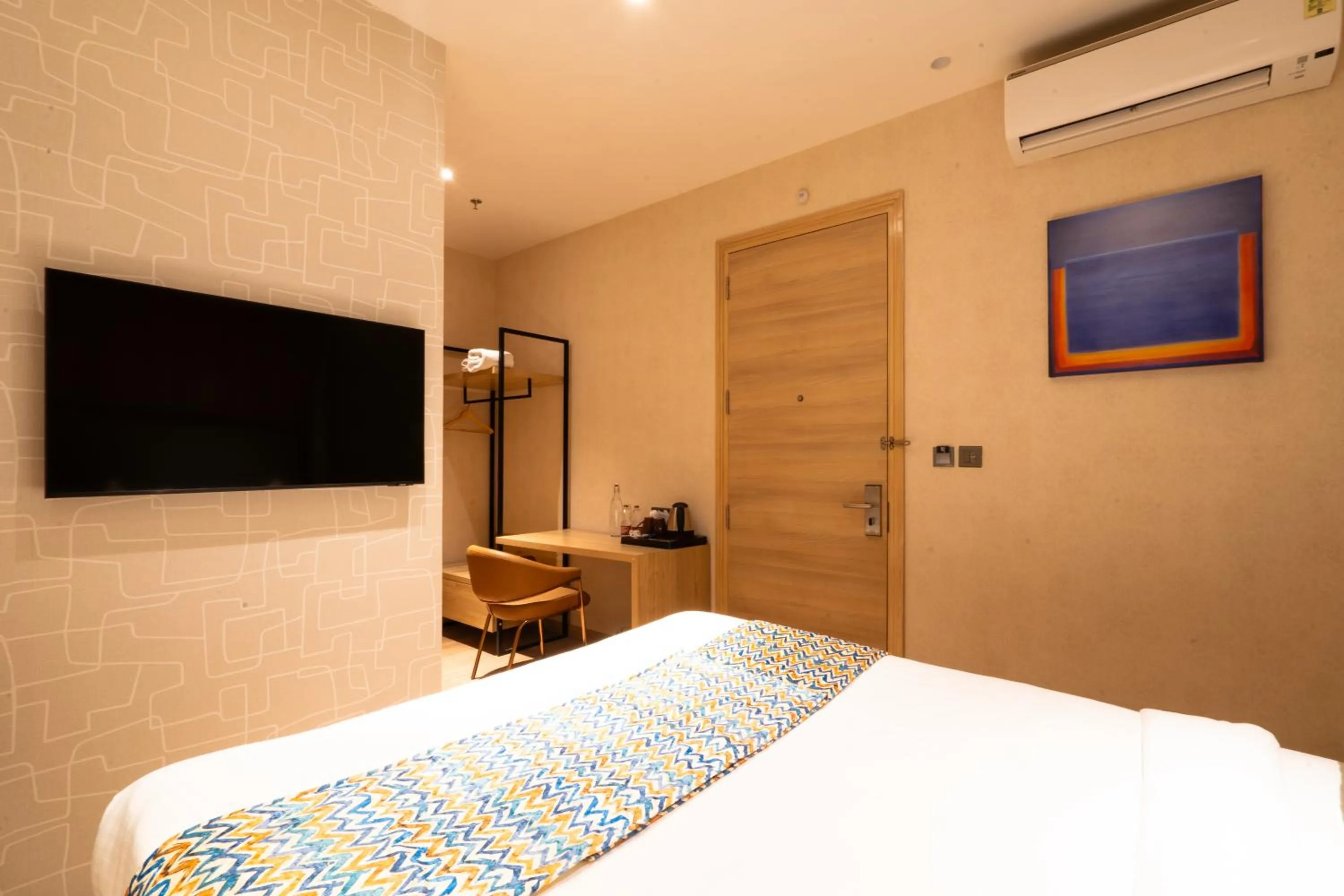 Bedroom, Bed in Hotel Bluestone Prime Nehru Place by The Cosy hotels
