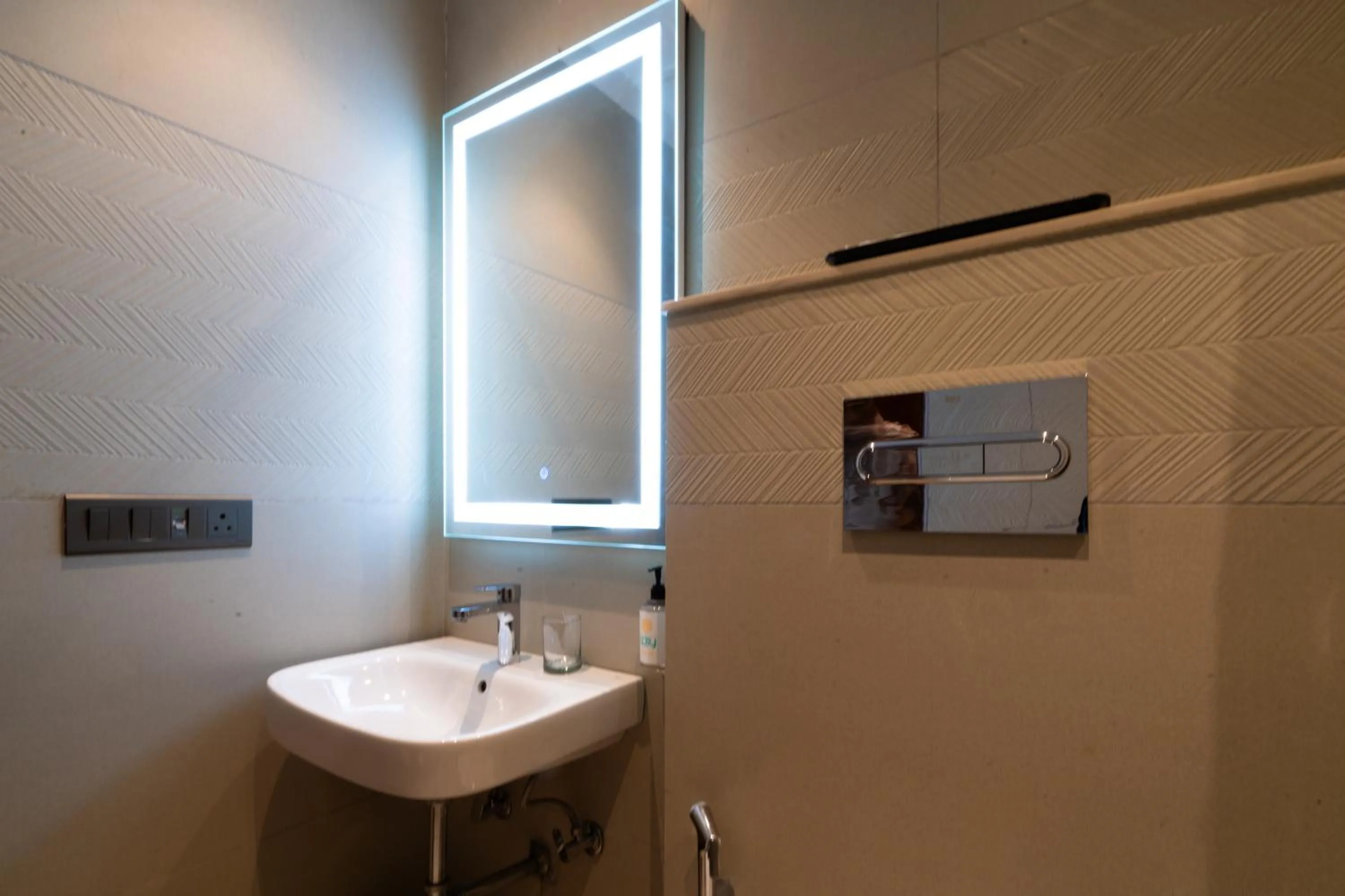 Bathroom in Hotel Bluestone Prime Nehru Place by The Cosy hotels