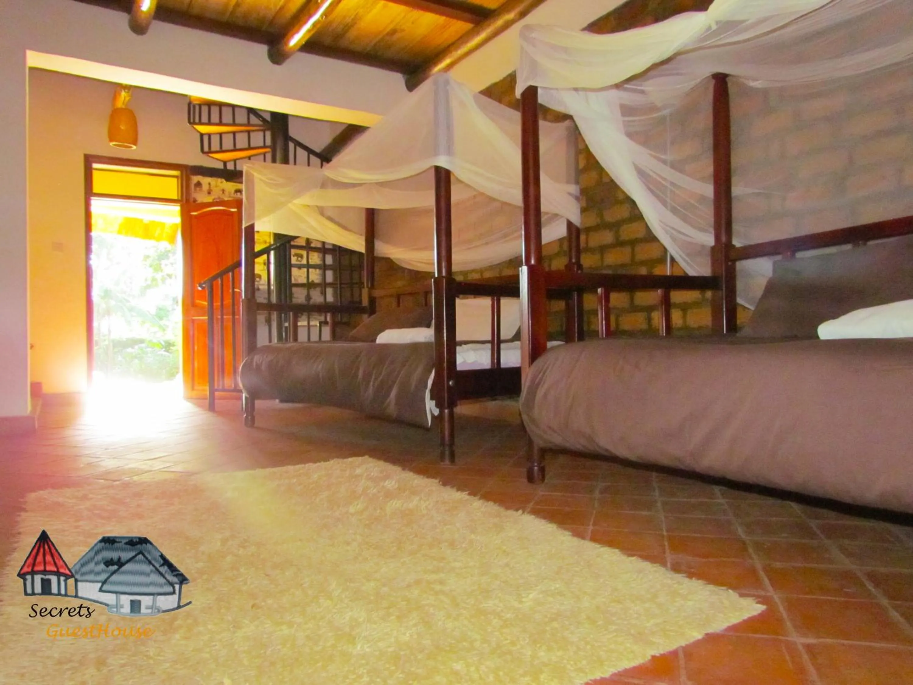Bed in Secrets Guest House