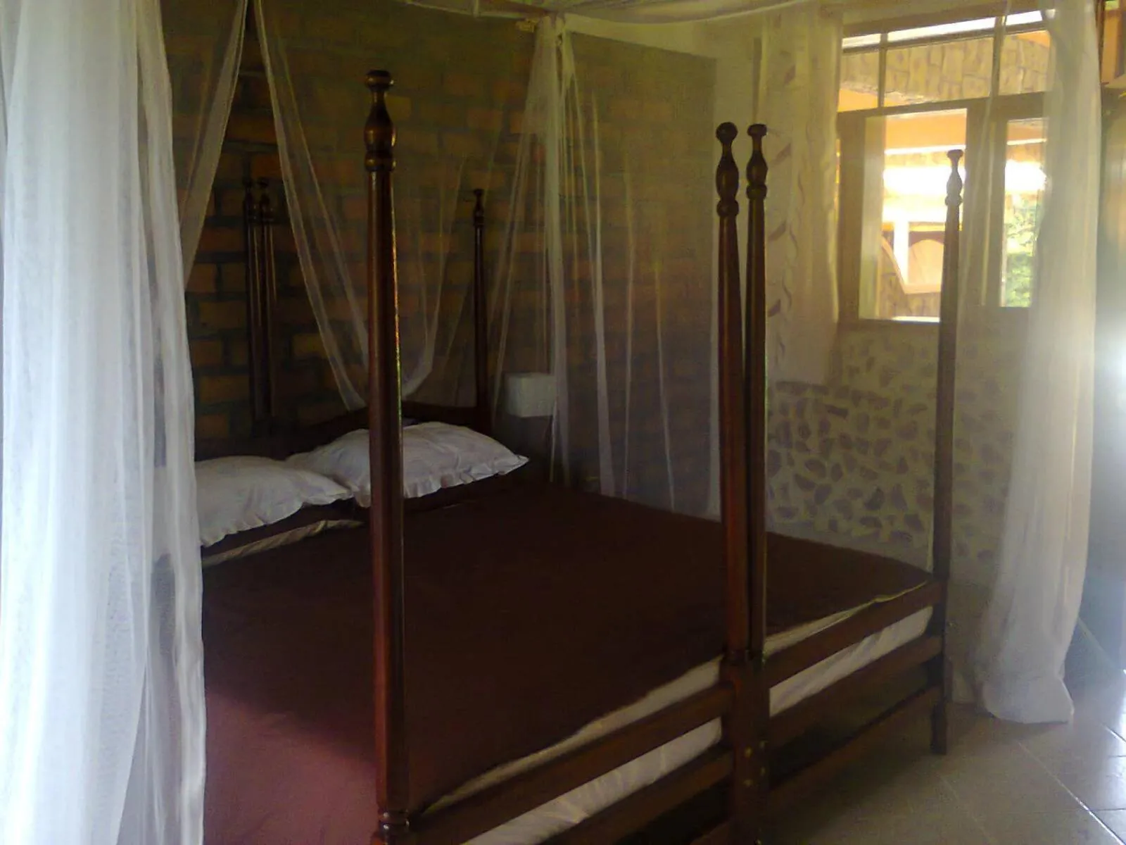 Bed in Secrets Guest House