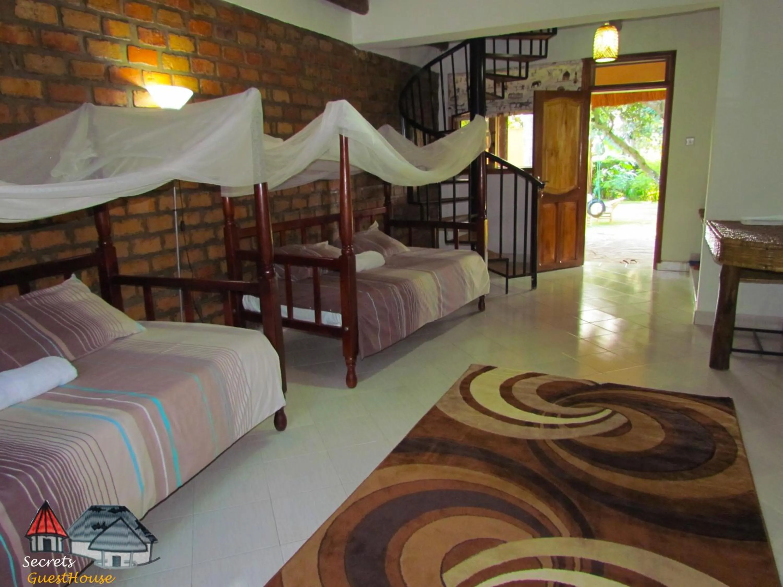 Bed in Secrets Guest House