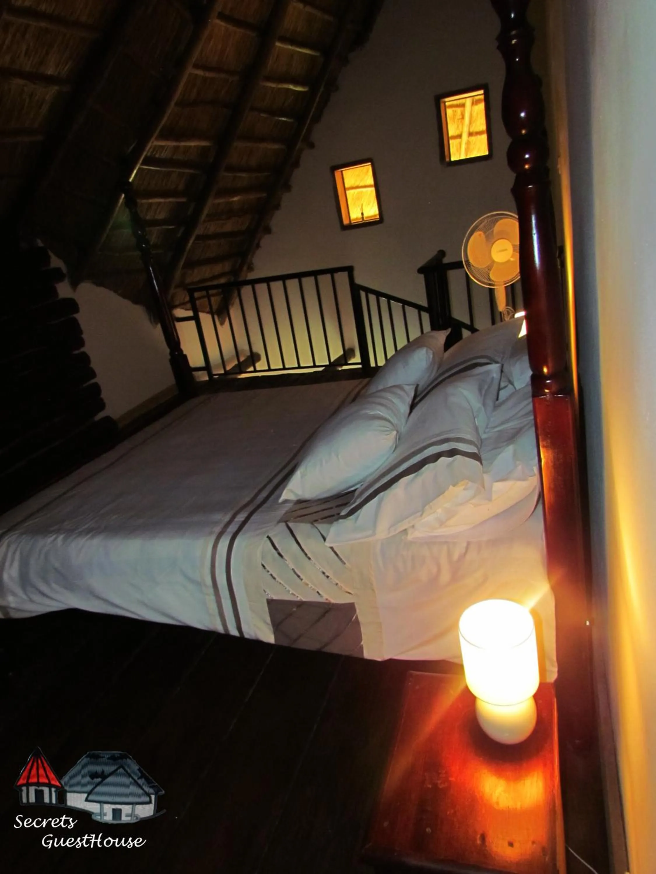 Bed in Secrets Guest House