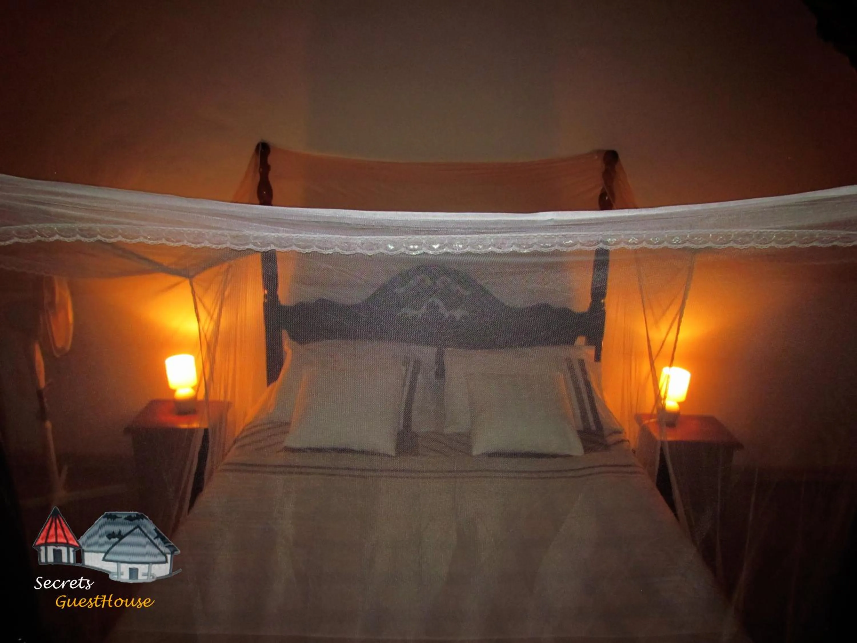 Bed in Secrets Guest House
