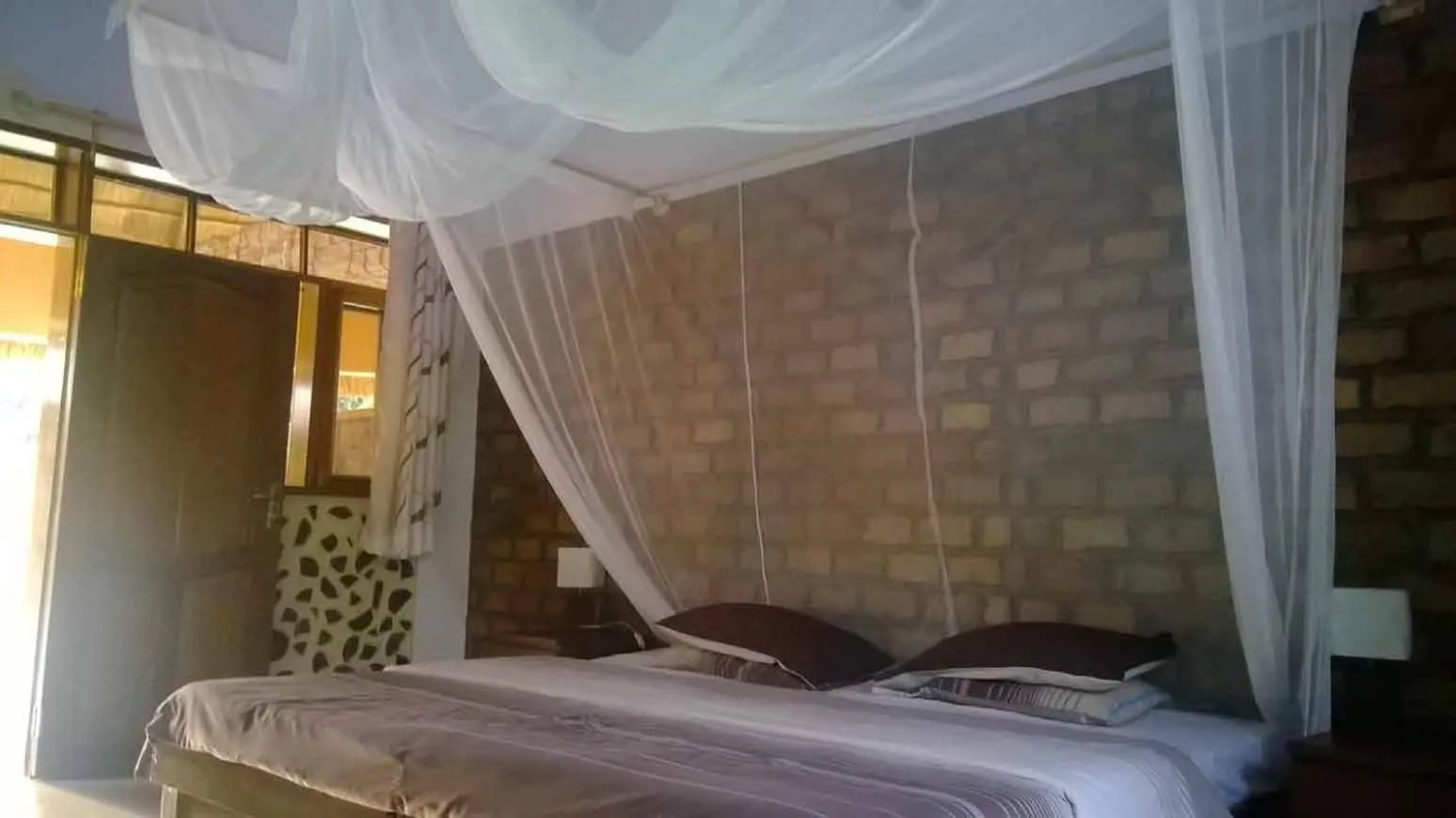 Bed in Secrets Guest House