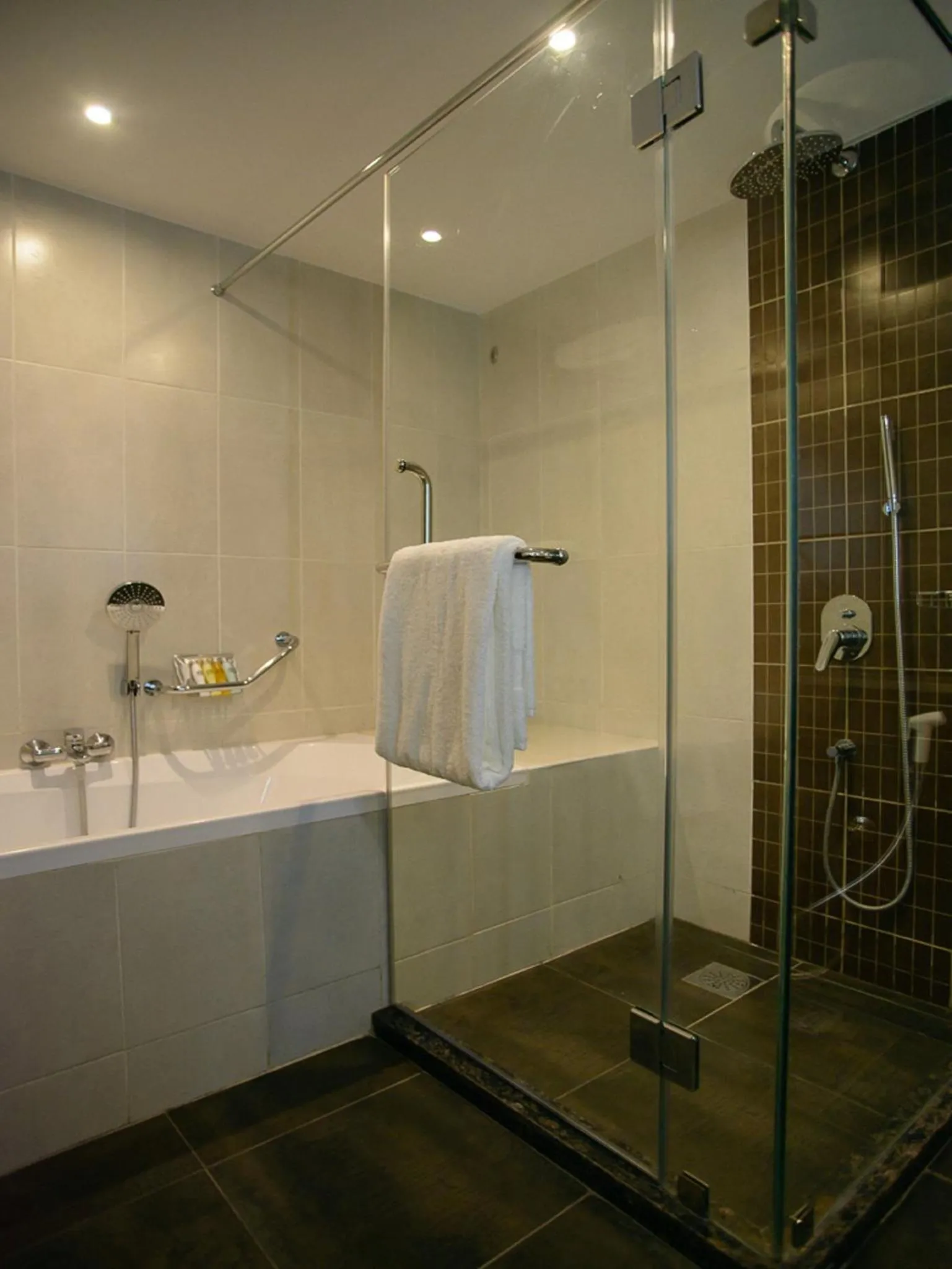 Shower in The Concord Hotel & Suites