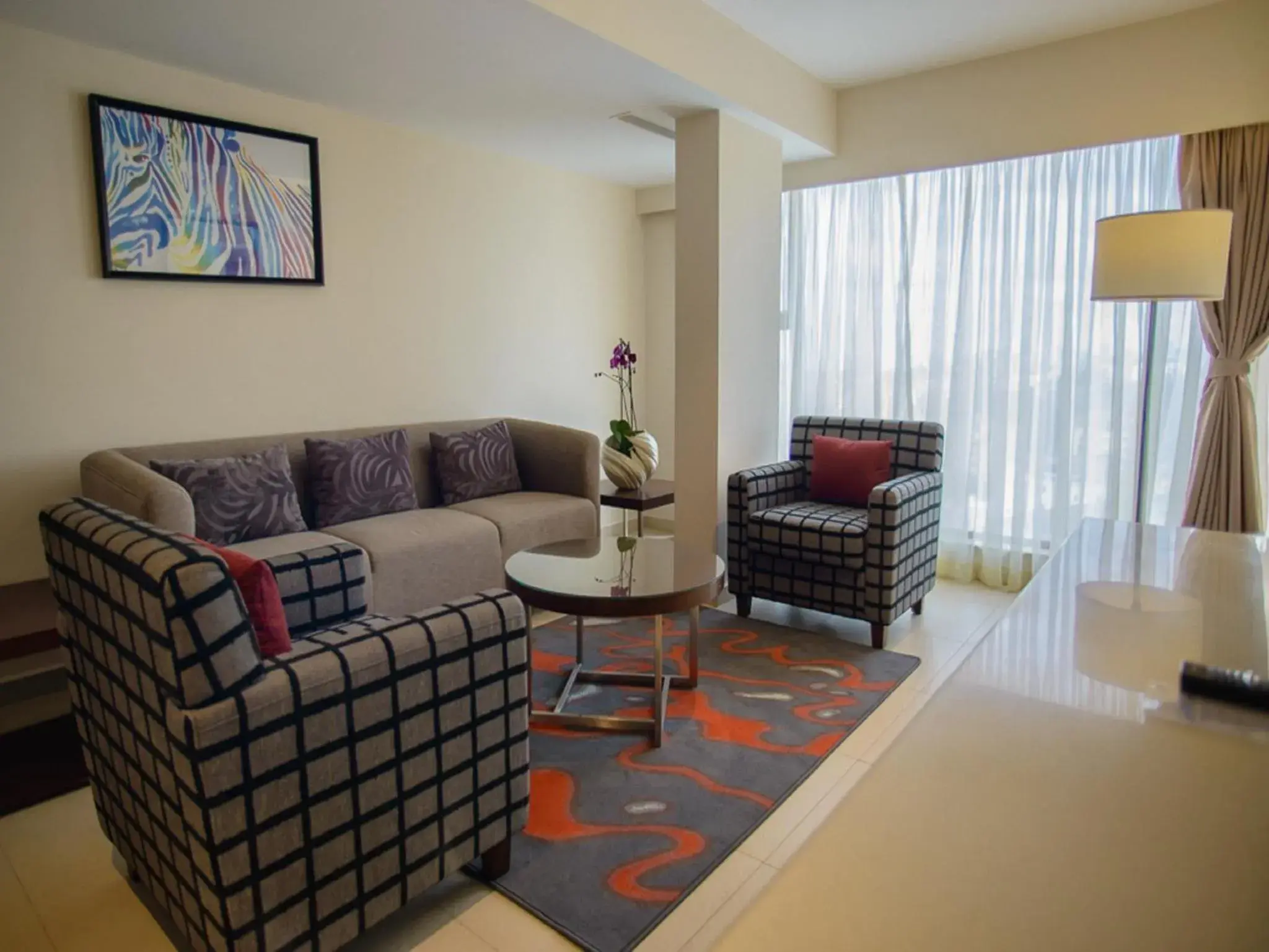 Living room in The Concord Hotel & Suites Living room in The Concord Hotel & Suites