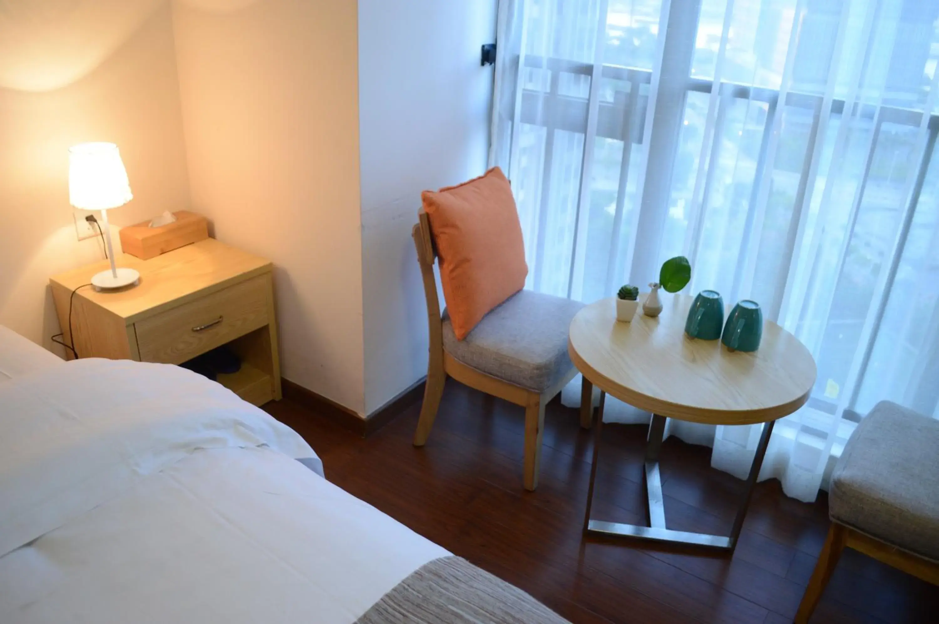 Decorative detail, Bed in Xizhengjia Apartment Hotel Pazhou Complex Decorative detail, Bed in Xizhengjia Apartment Hotel Pazhou Complex