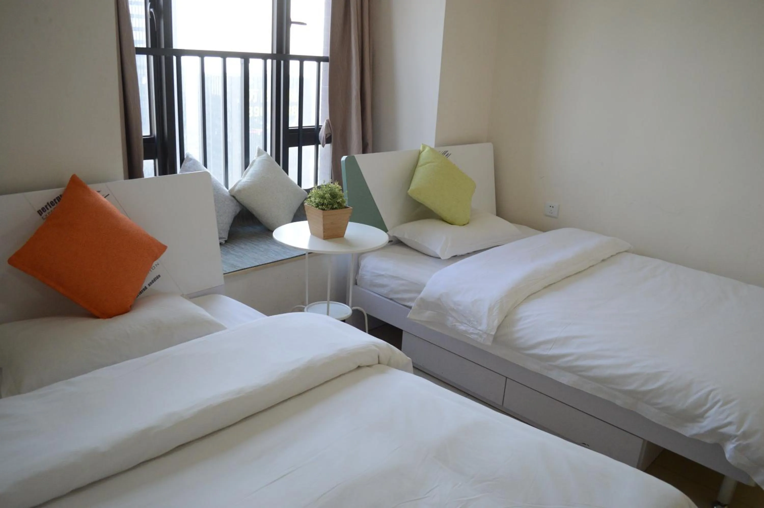 Bed in Xizhengjia Apartment Hotel Pazhou Complex