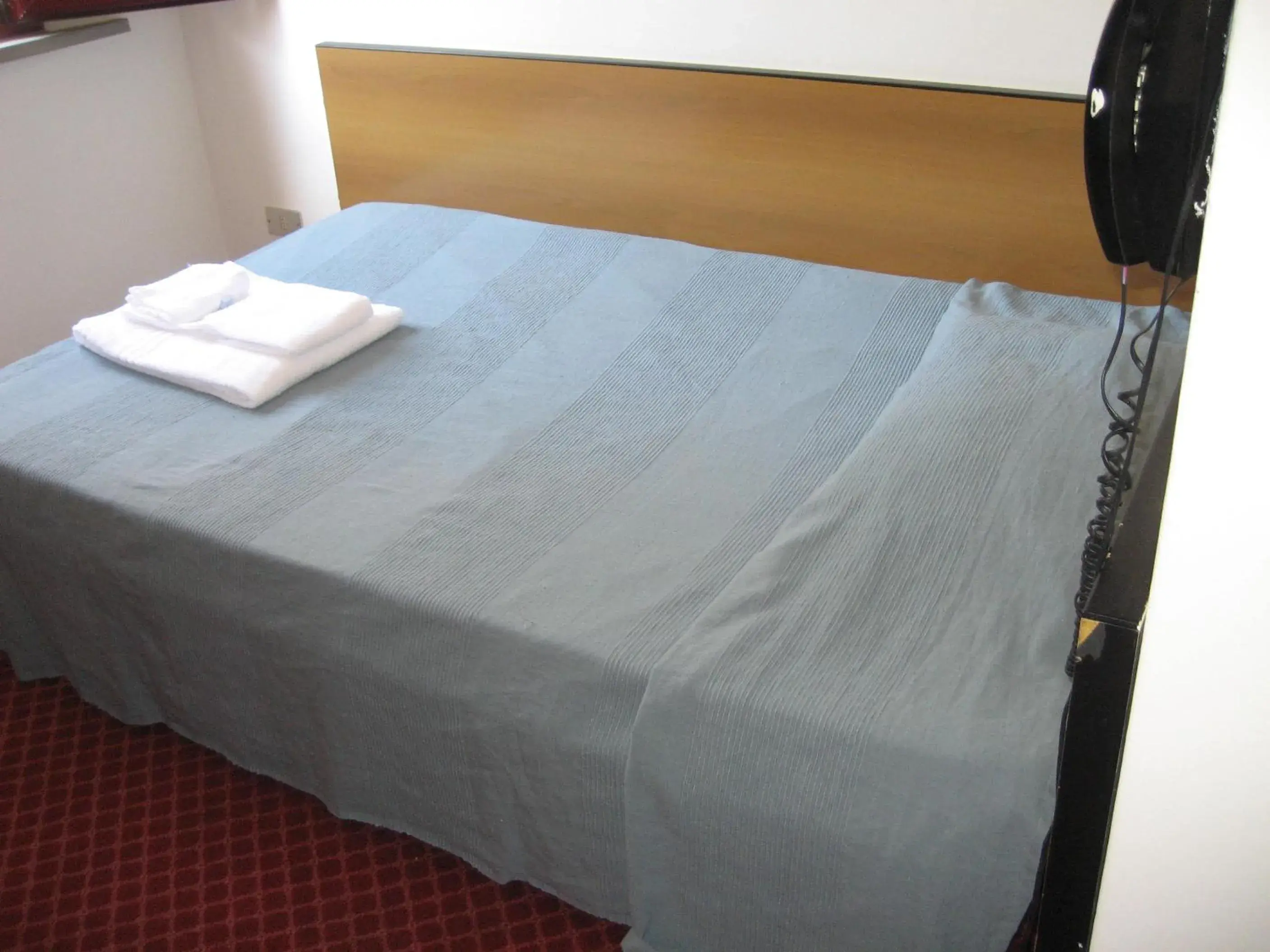 Bedroom in Hotel Niagara Bedroom in Hotel Niagara