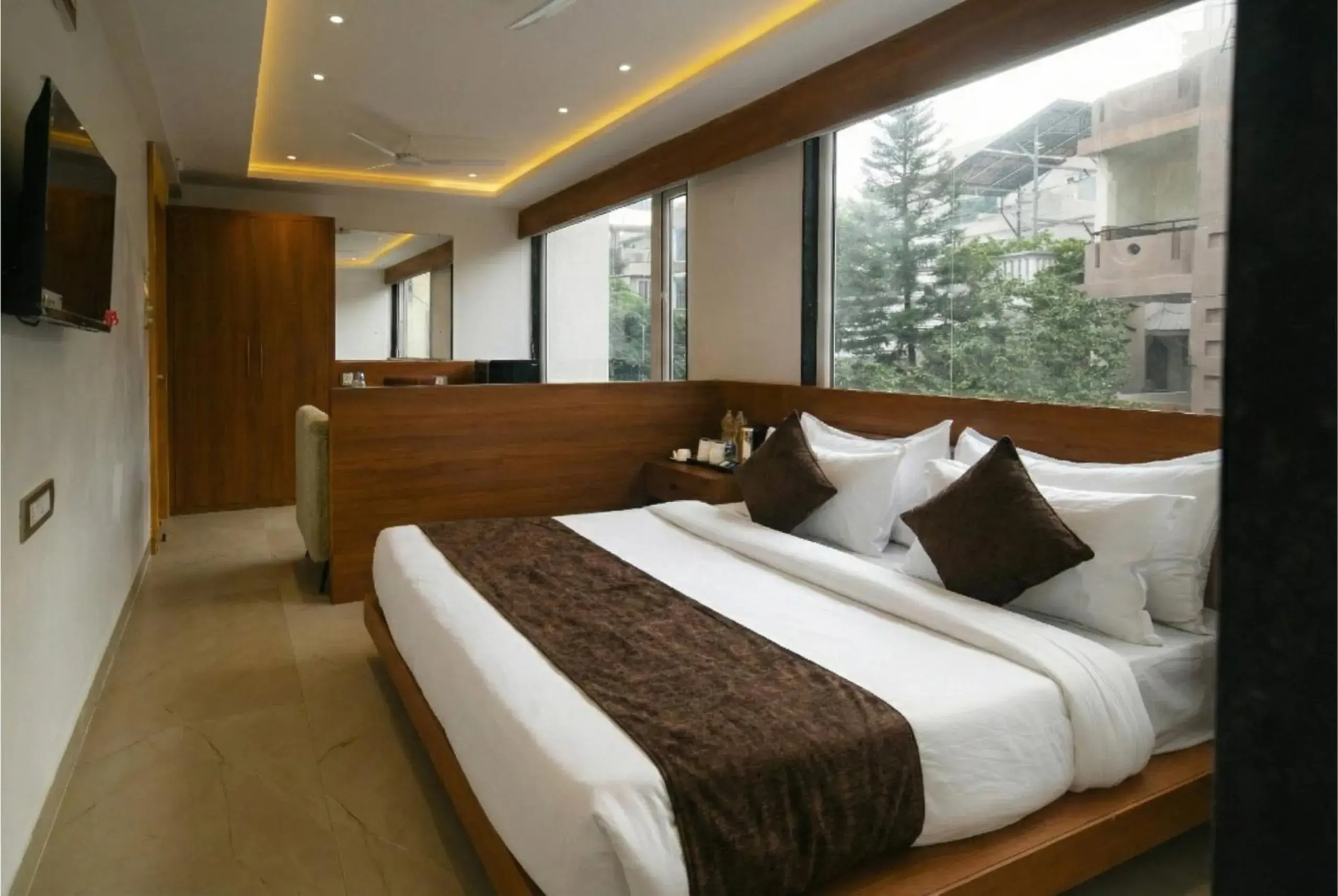 Executive Triple Room in The Avinya Stay Executive Triple Room in The Avinya Stay
