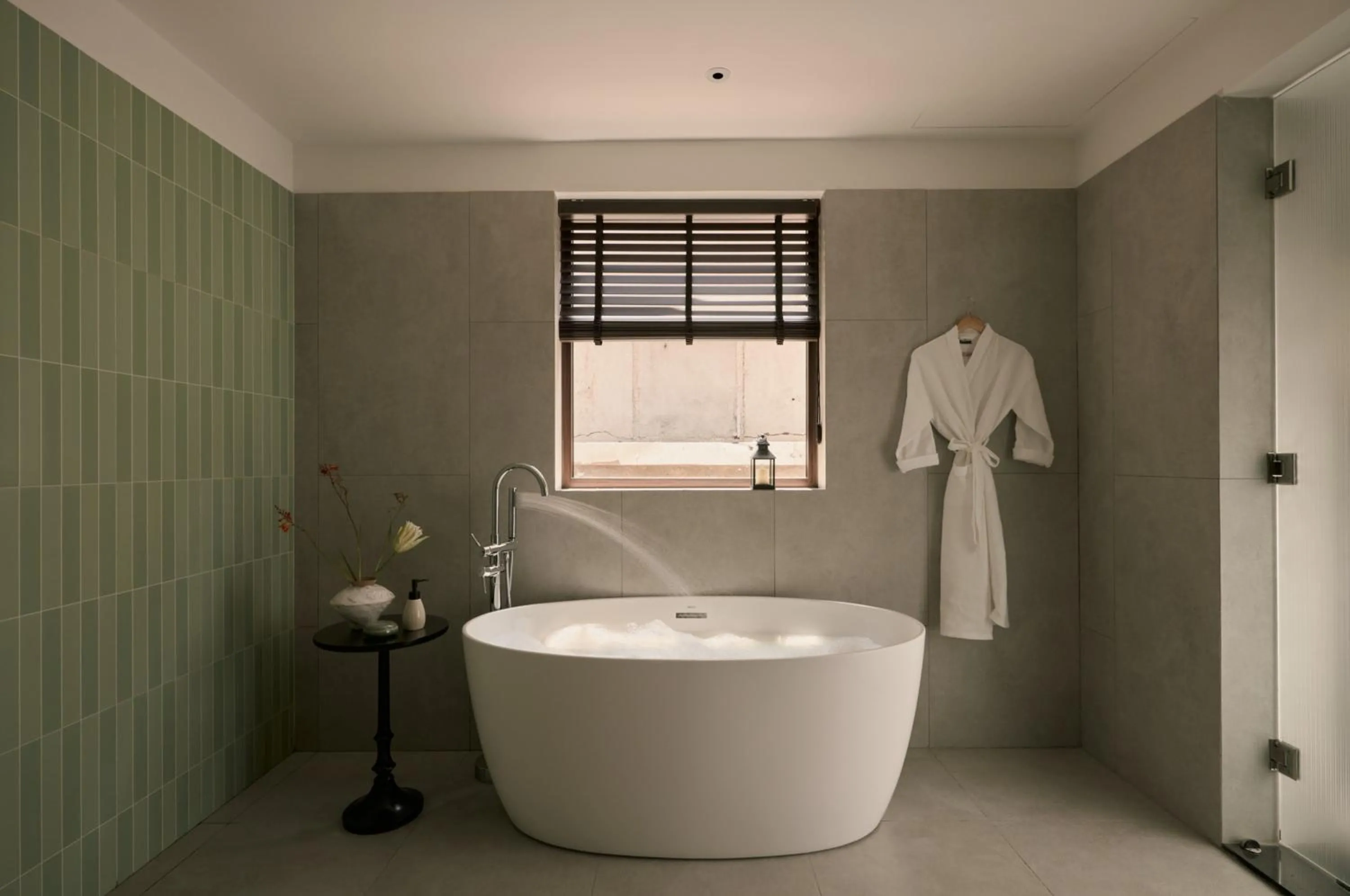 Bathroom in Grand Signature By M Village Hoi An Resort