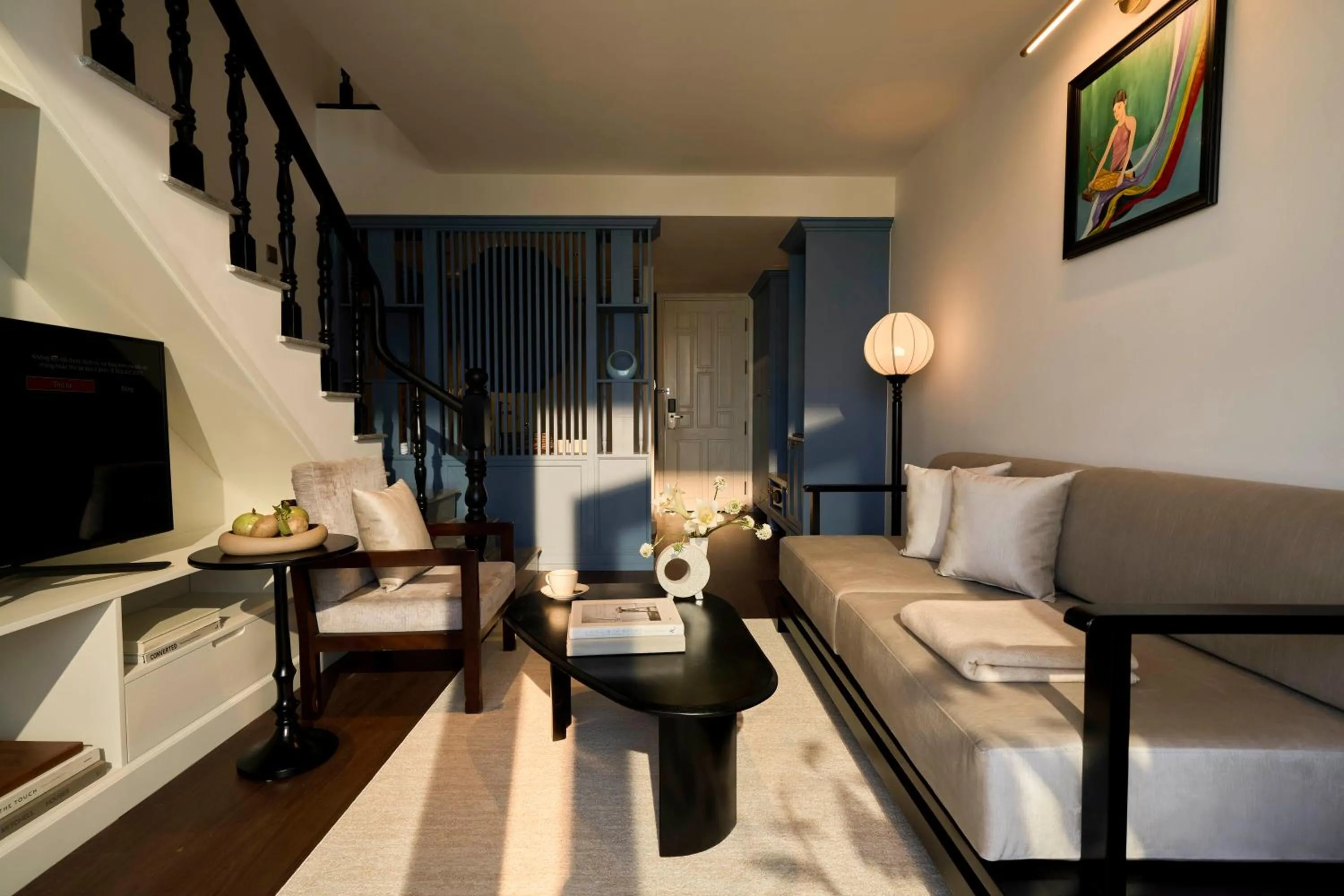 Communal lounge/ TV room in Grand Signature By M Village Hoi An Resort