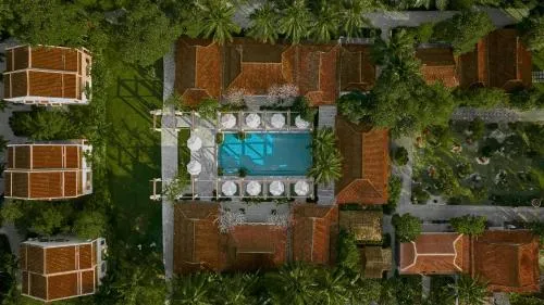 Swimming pool in Grand Signature By M Village Hoi An Resort