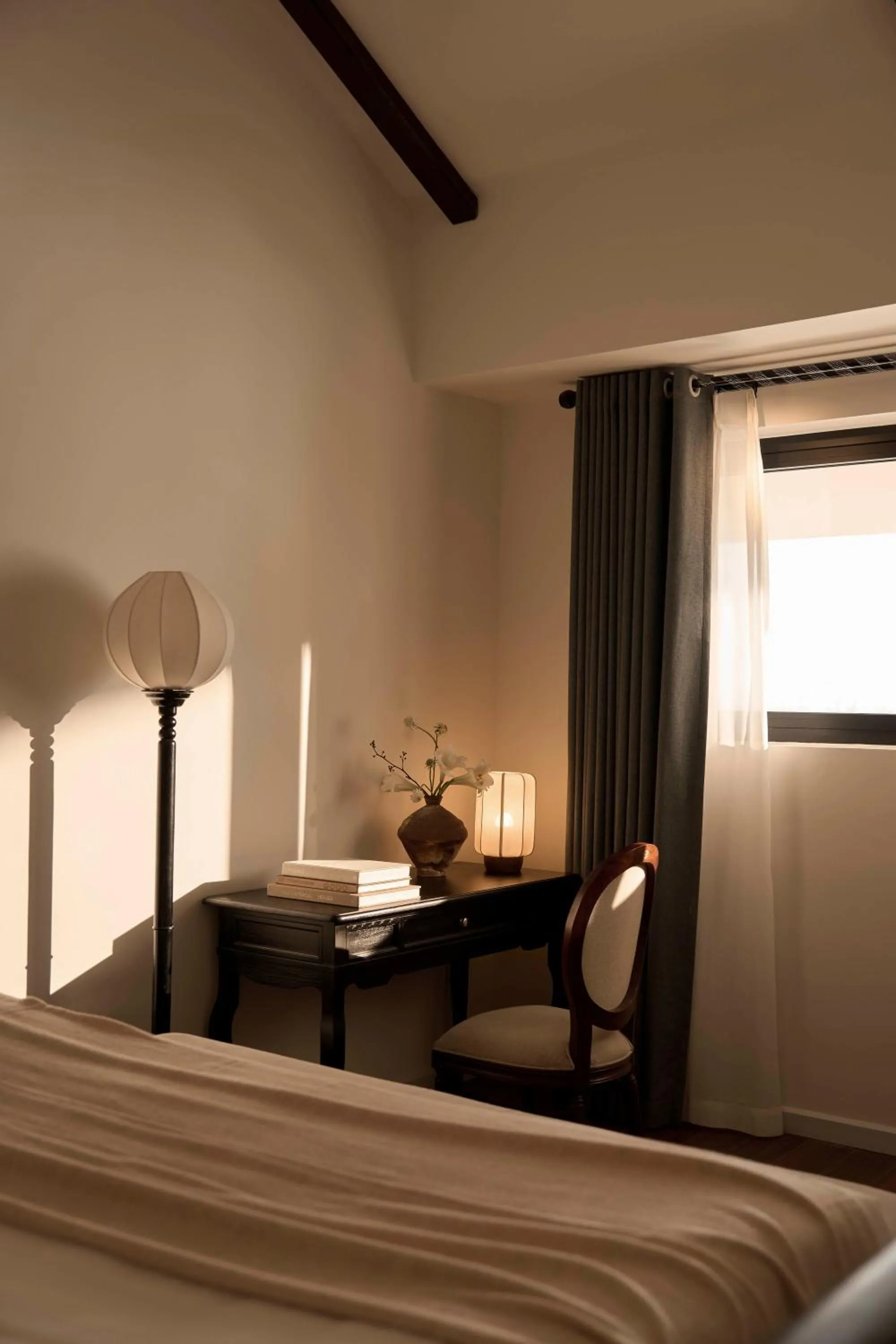 Seating area, Bed in Grand Signature By M Village Hoi An Resort