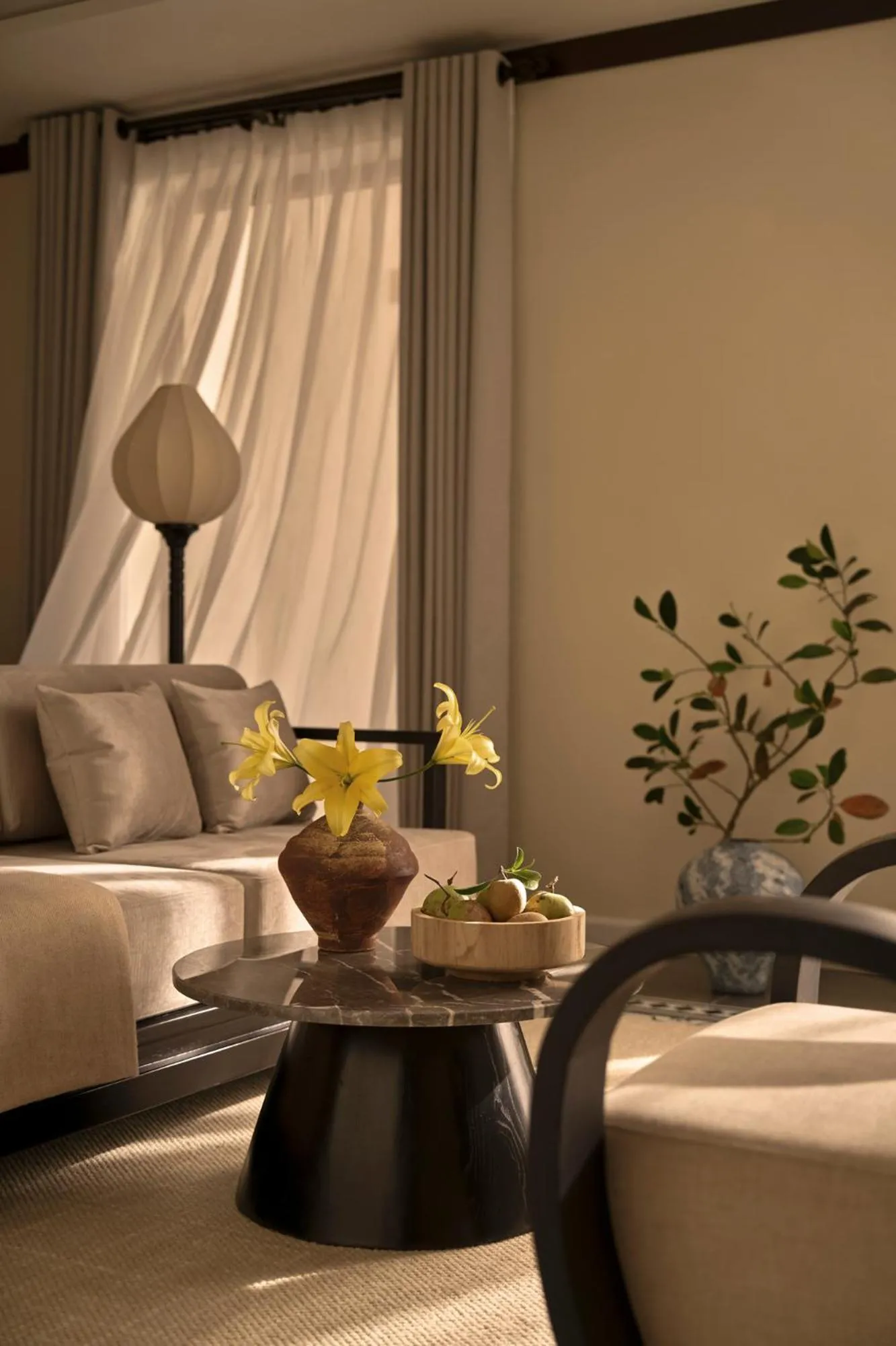 Seating area in Grand Signature By M Village Hoi An Resort
