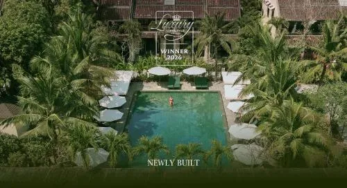 Swimming pool in Grand Signature By M Village Hoi An Resort