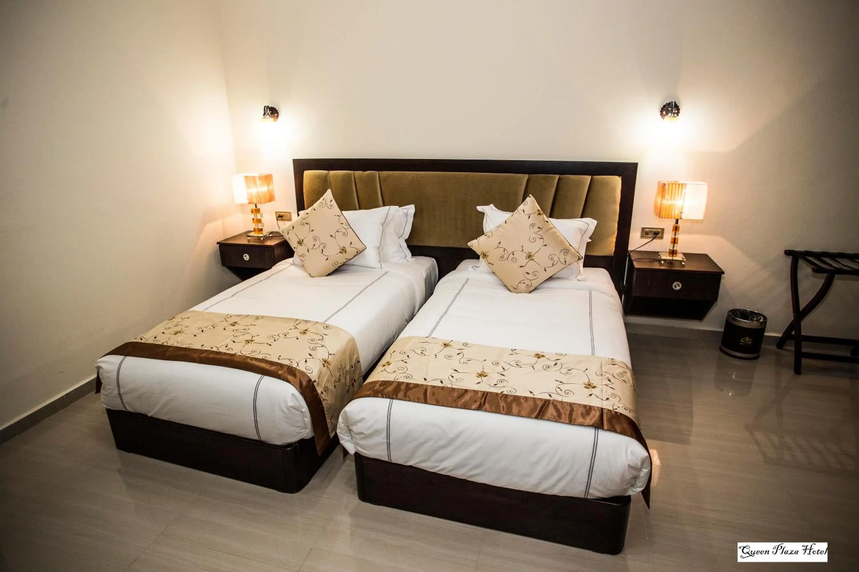 Photo of the whole room, Bed in Queen Plaza Hotel