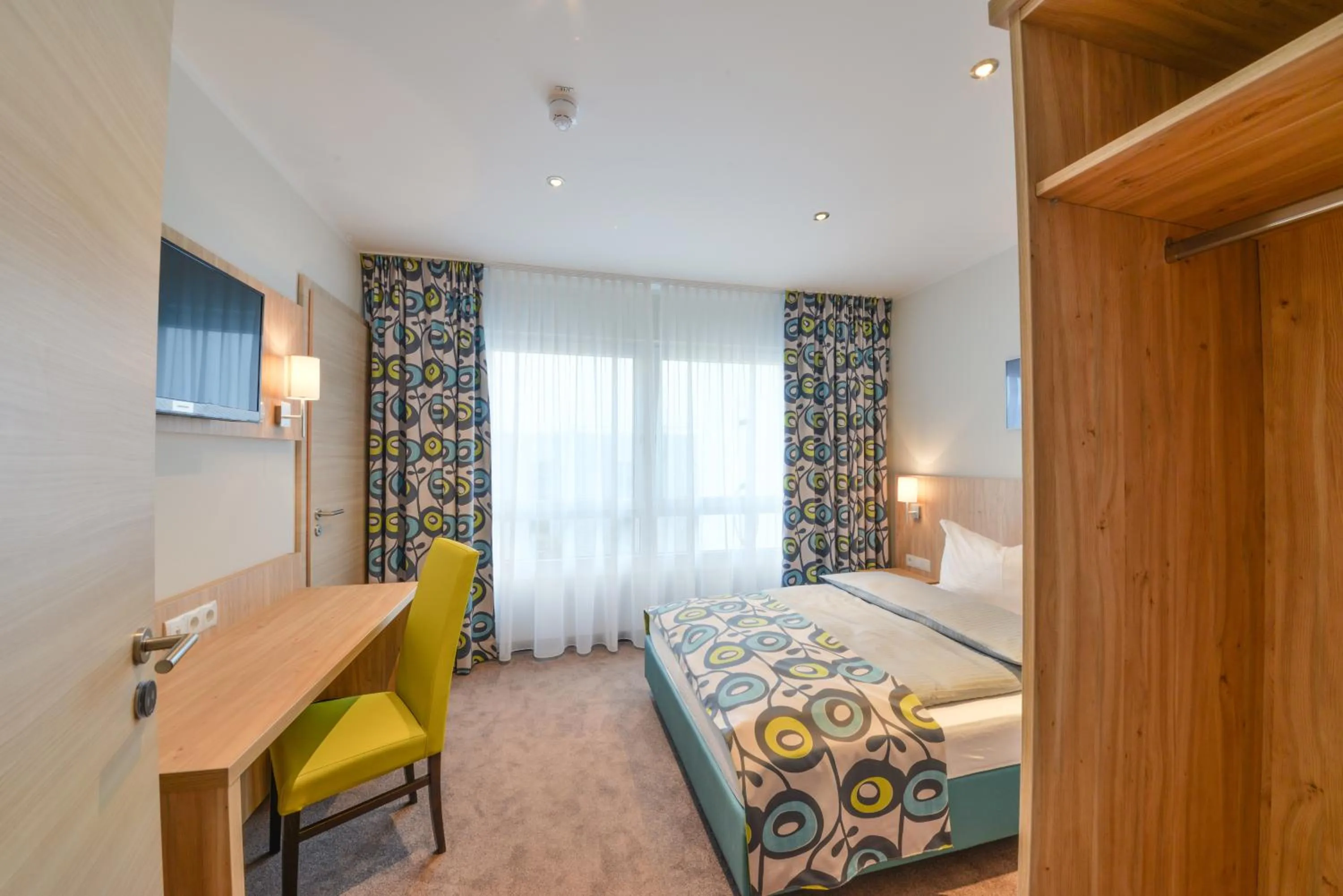 Photo of the whole room, Bed in Ammi Hotel Garni