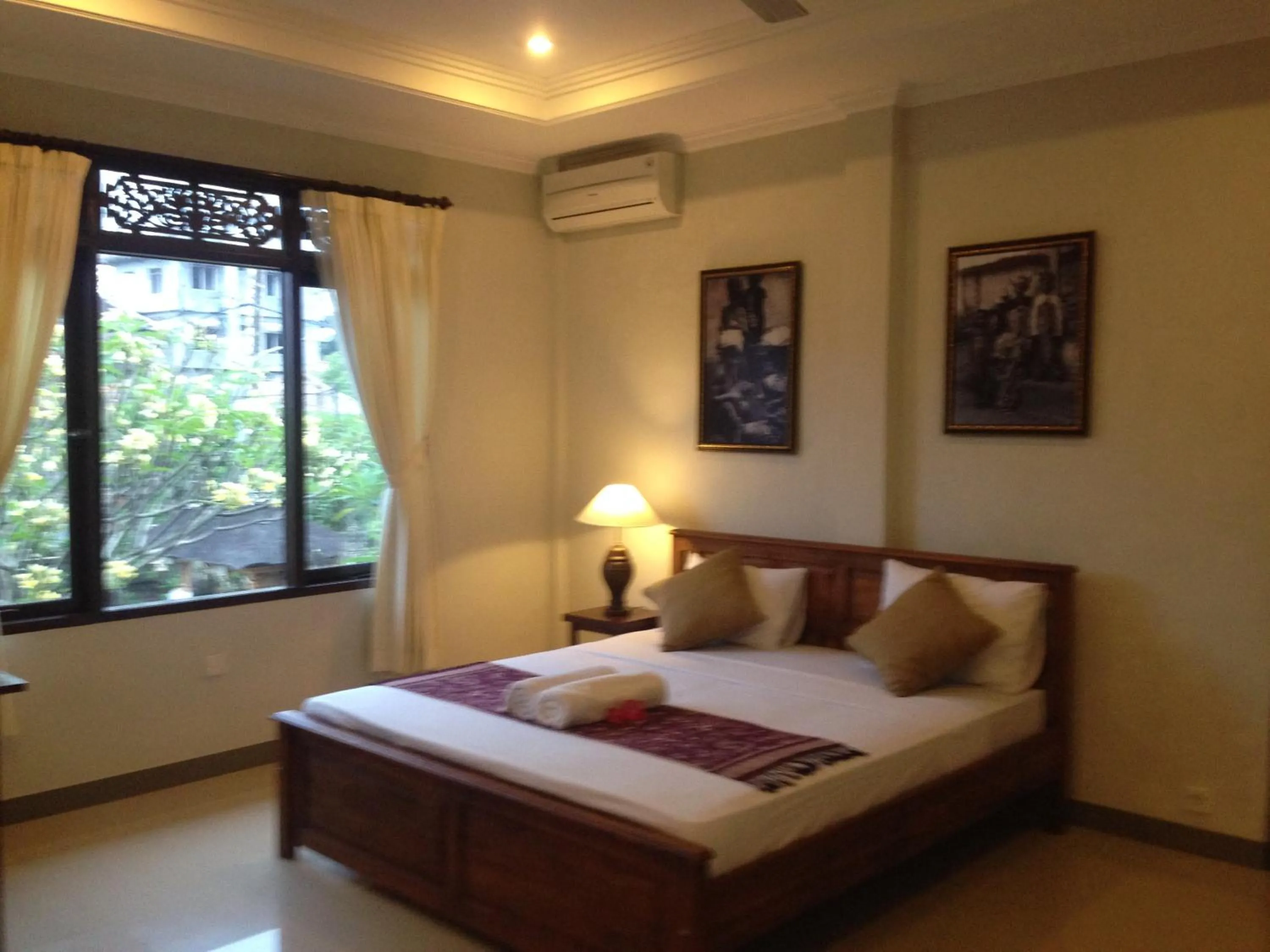 Photo of the whole room, Bed in Wina Ubud B&B