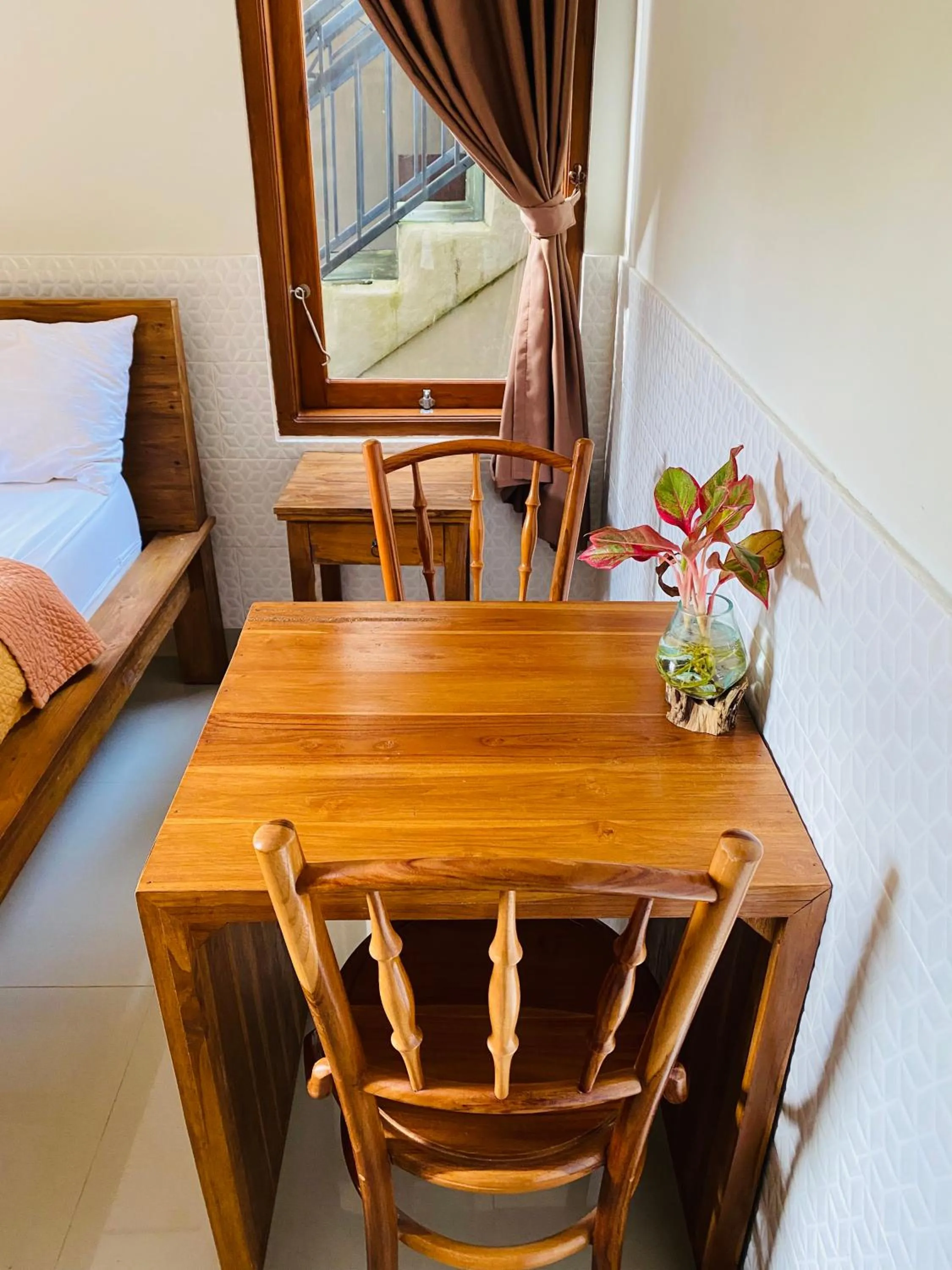 Decorative detail, Bed in Wina Ubud B&B