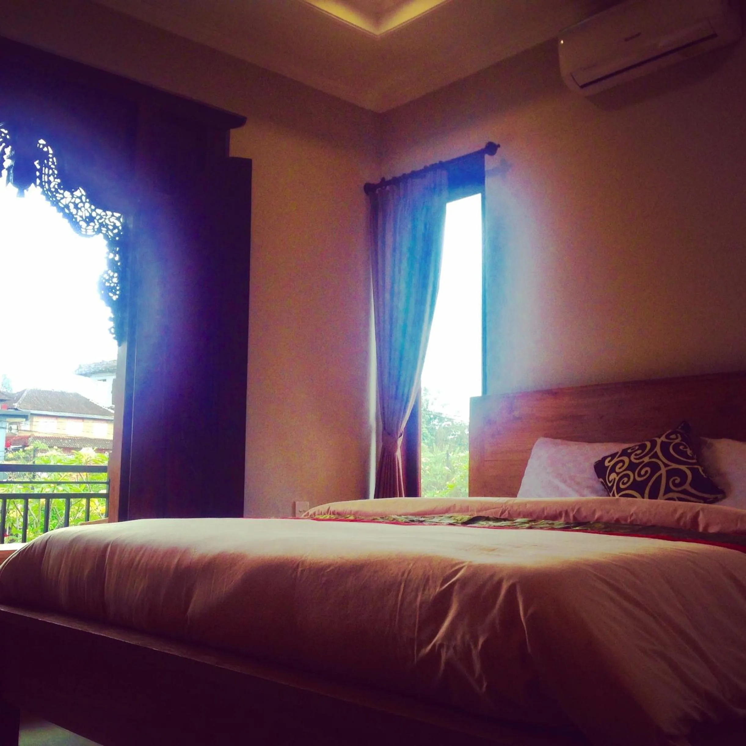 Bed in Wina Ubud B&B