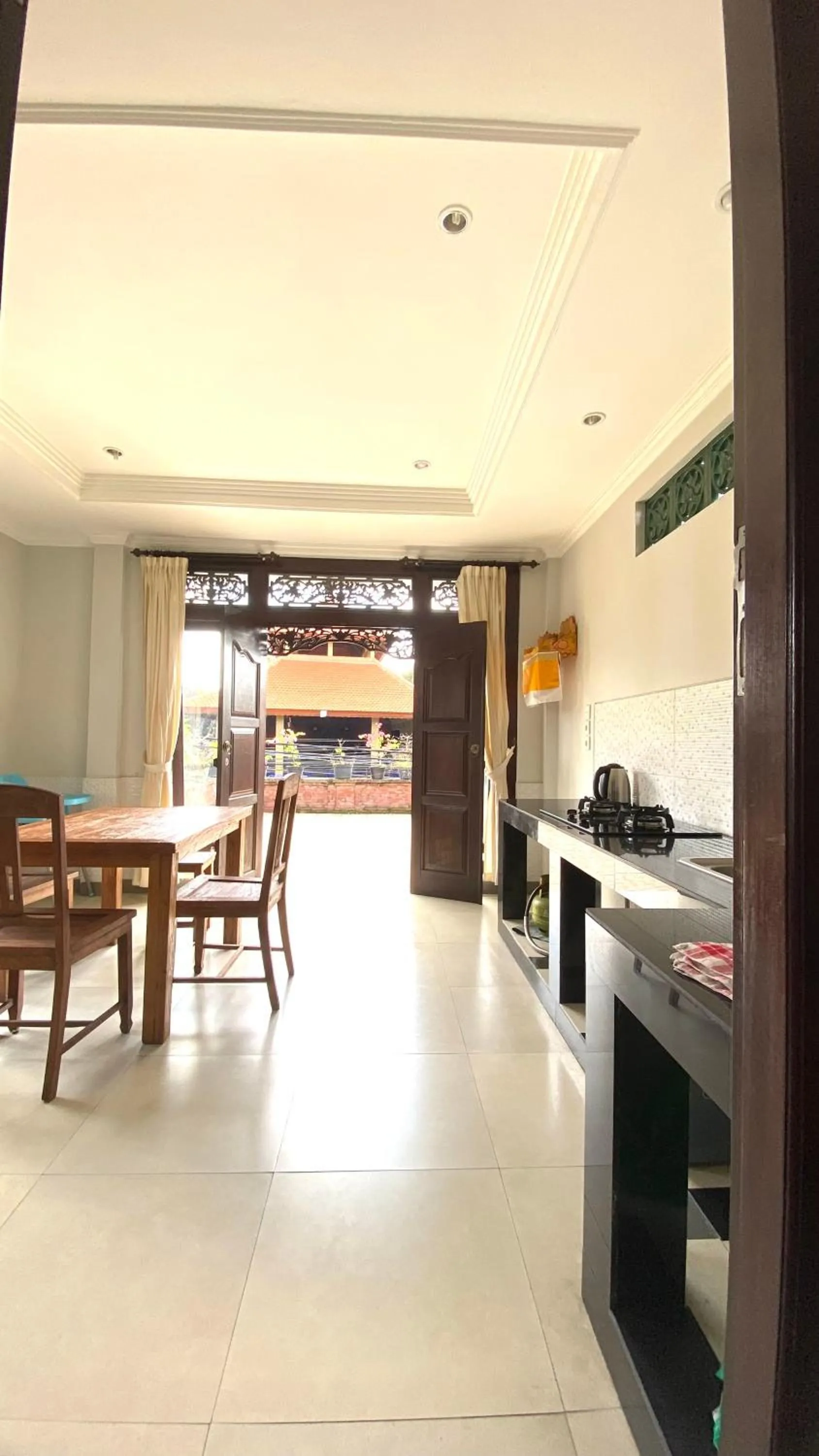 Kitchen or kitchenette in Wina Ubud B&B