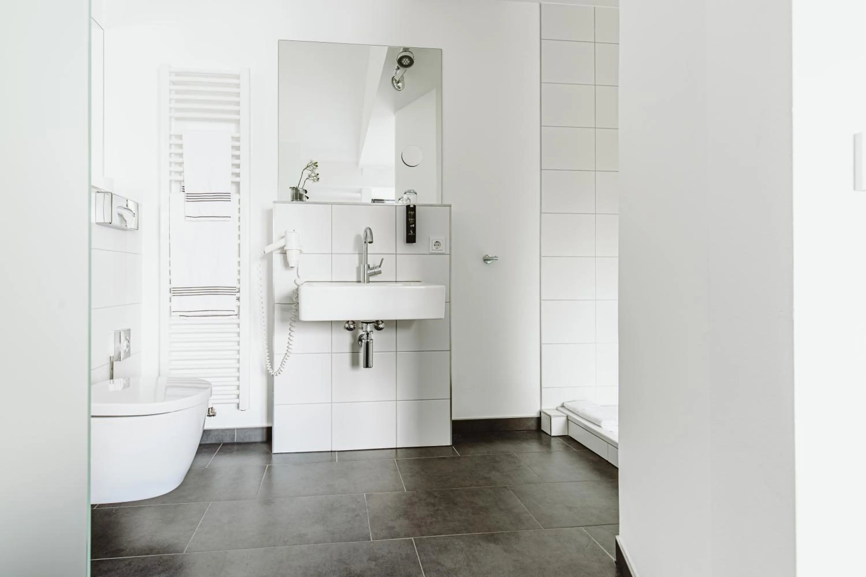 Bathroom in &REPEAT Köln Airport