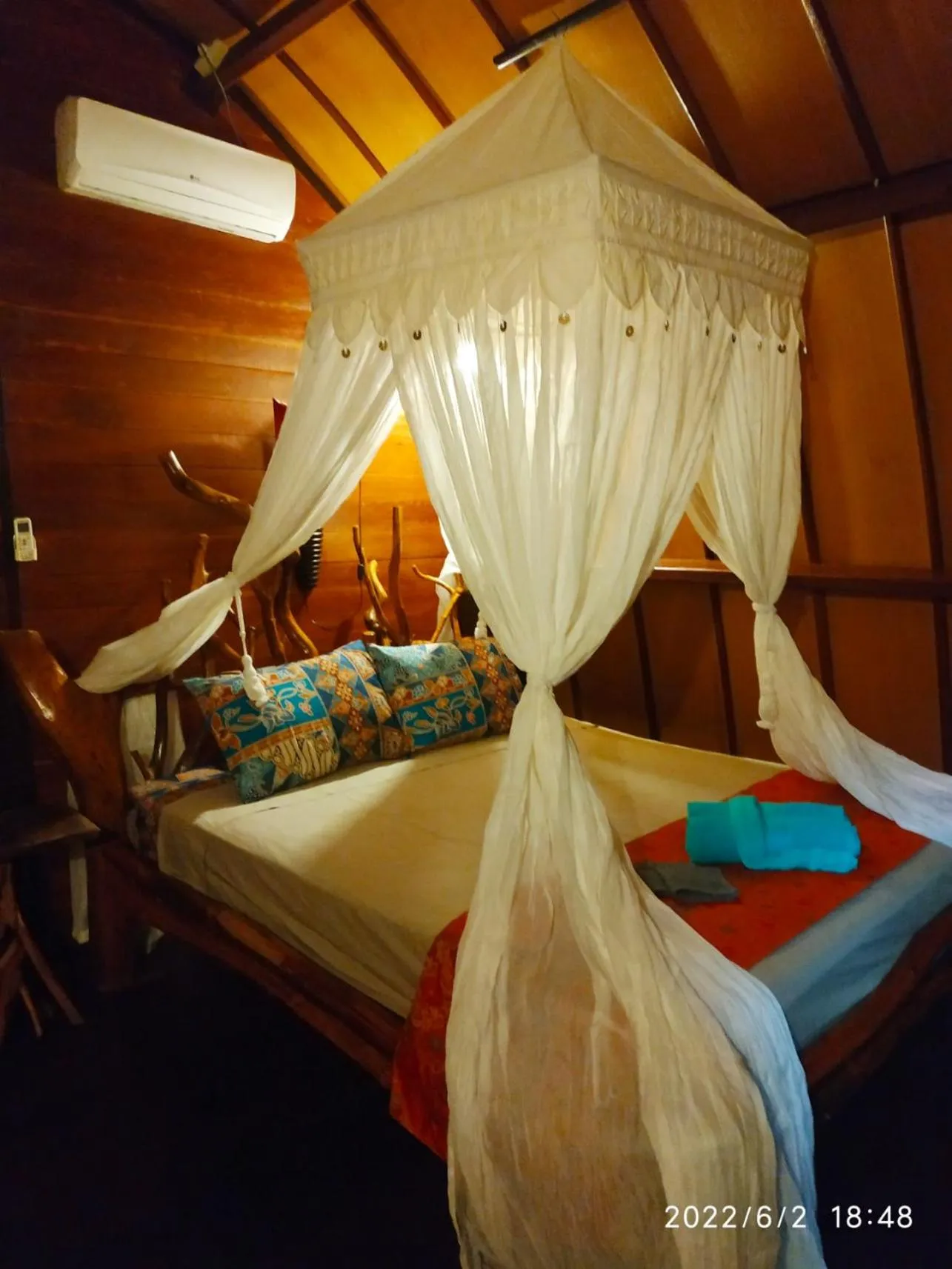 Bed in Kampung Meno Bungalows
