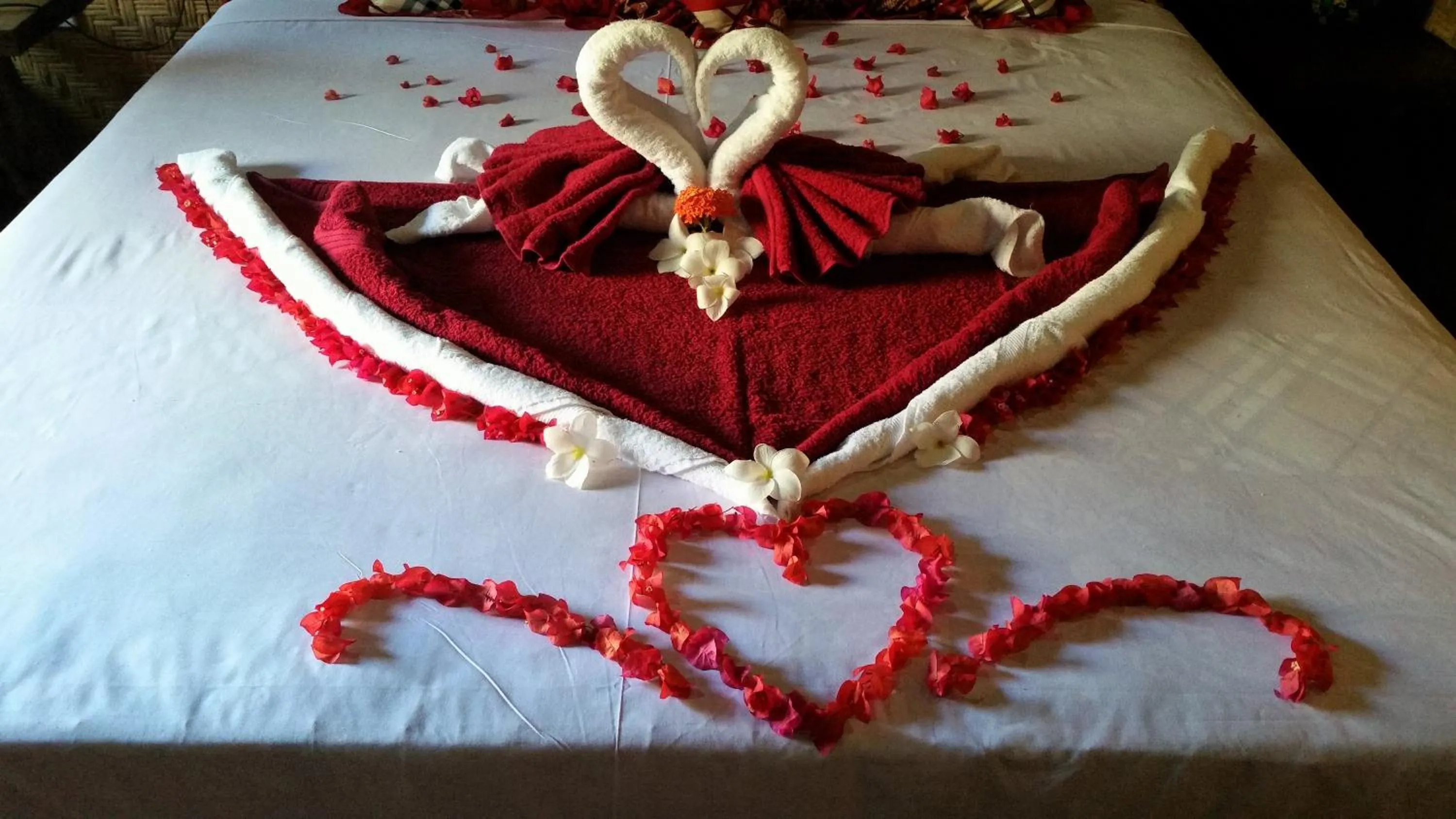 Bed in Kampung Meno Bungalows