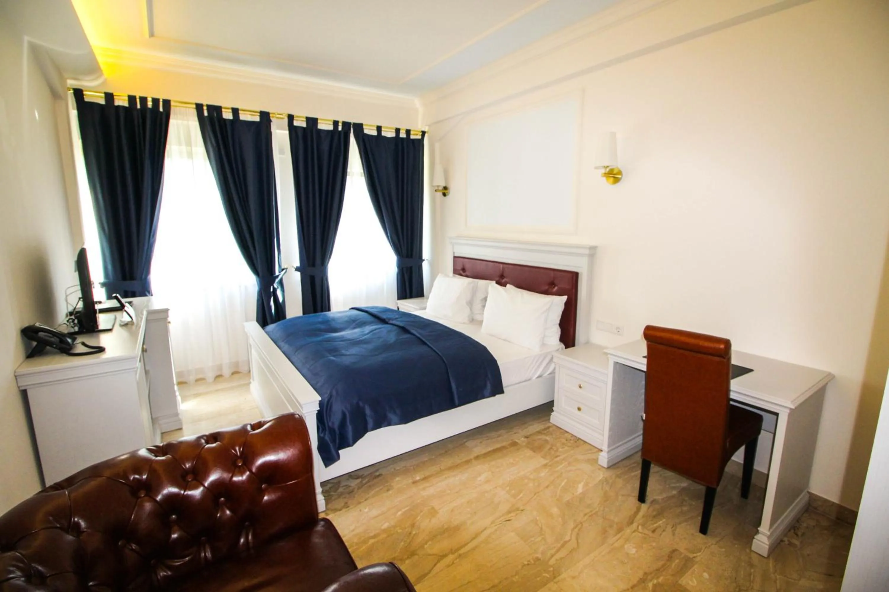 Bed in Grand Hotel Palladium