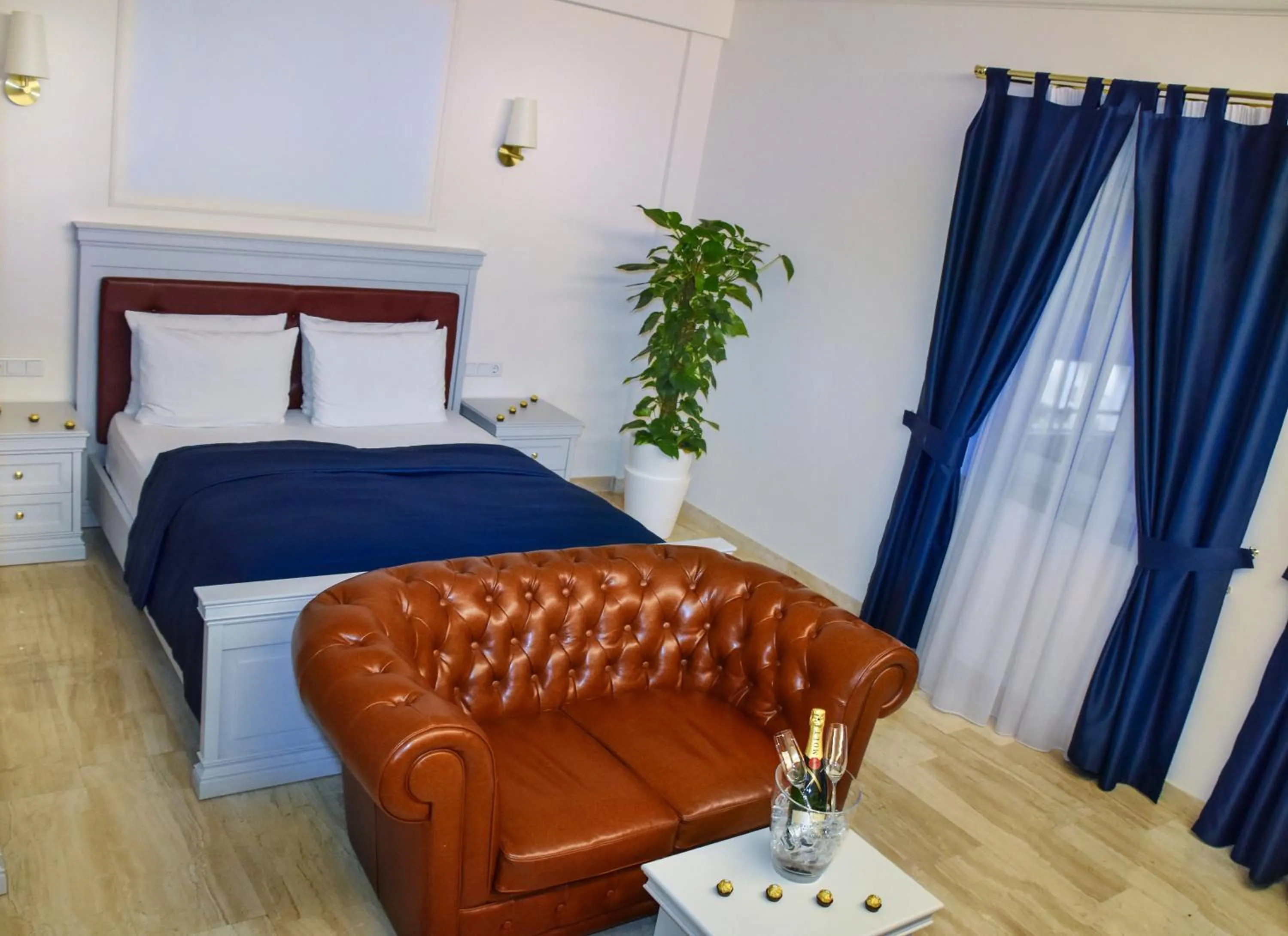 Living room, Bed in Grand Hotel Palladium