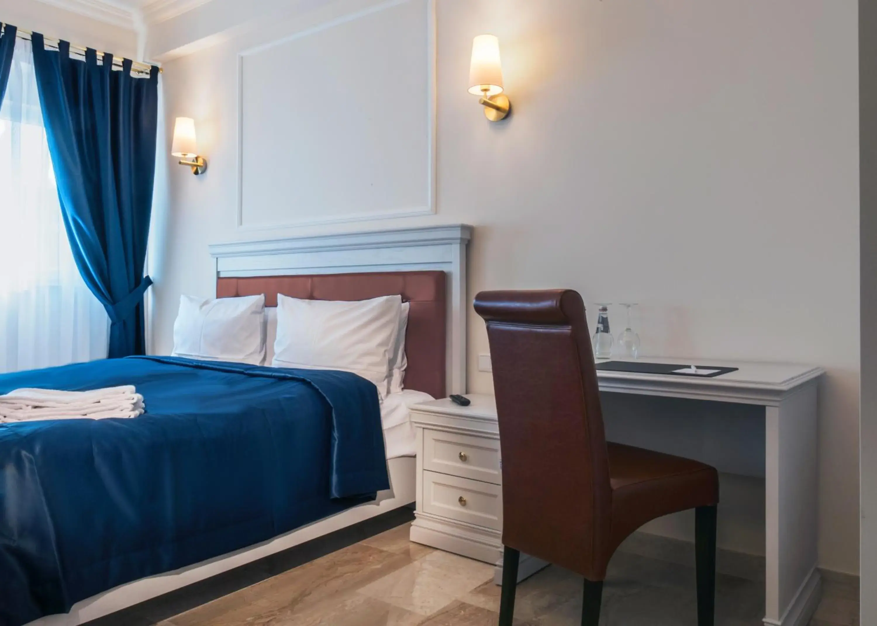 Photo of the whole room, Bed in Grand Hotel Palladium Photo of the whole room, Bed in Grand Hotel Palladium