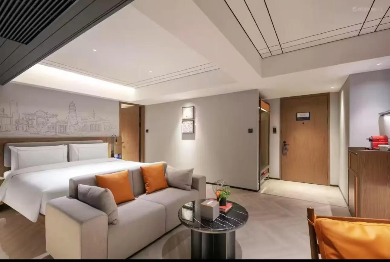 Living room, Bed in UrCove By Hyatt Shantou Xinyicheng Huanghe Road