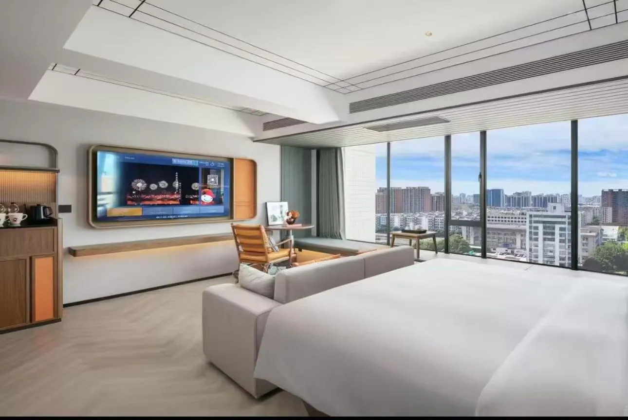 Photo of the whole room, Bed in UrCove By Hyatt Shantou Xinyicheng Huanghe Road