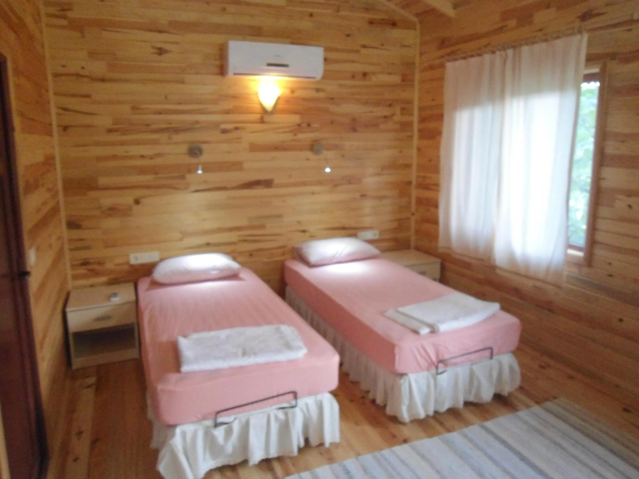 Photo of the whole room, Bed in Bungalow Halil
