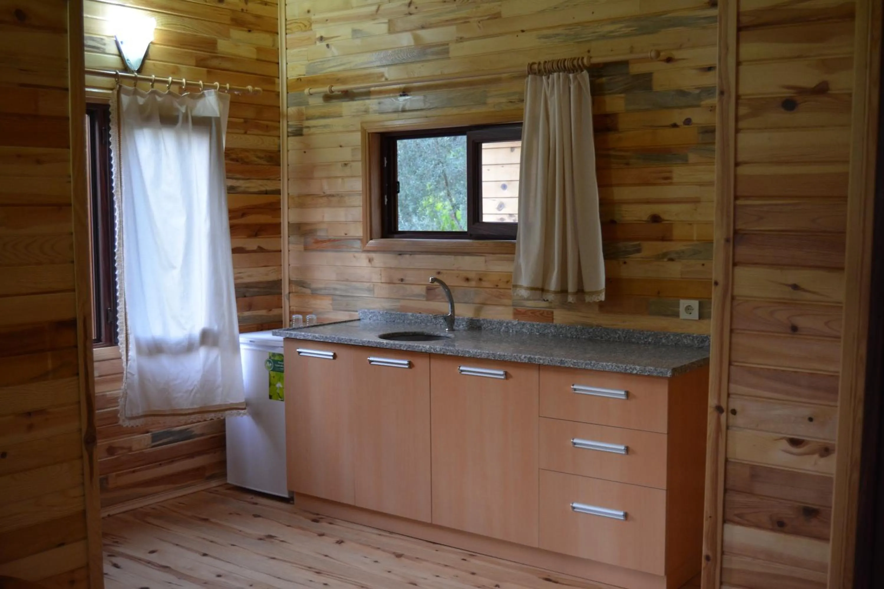 Kitchen or kitchenette in Bungalow Halil