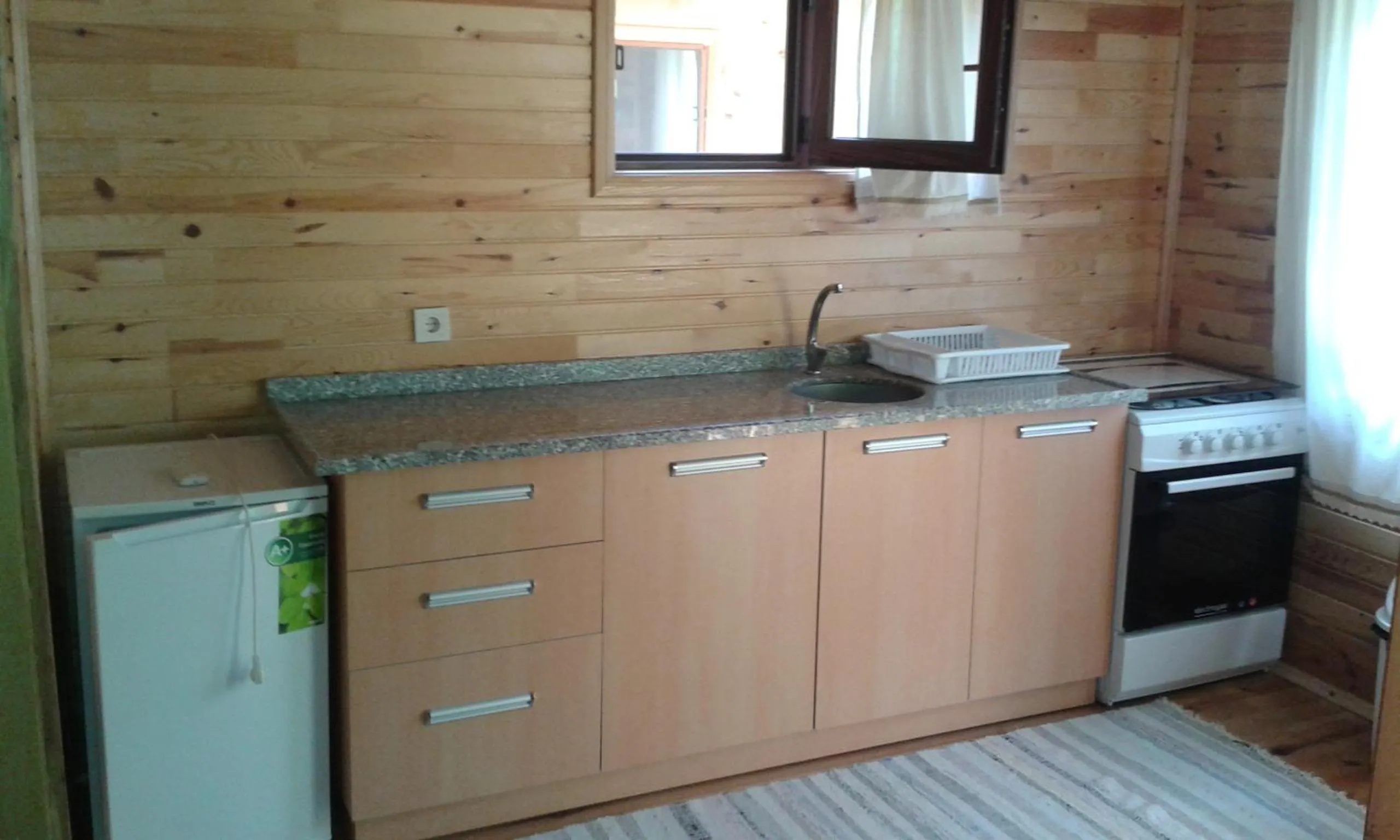 Kitchen or kitchenette in Bungalow Halil