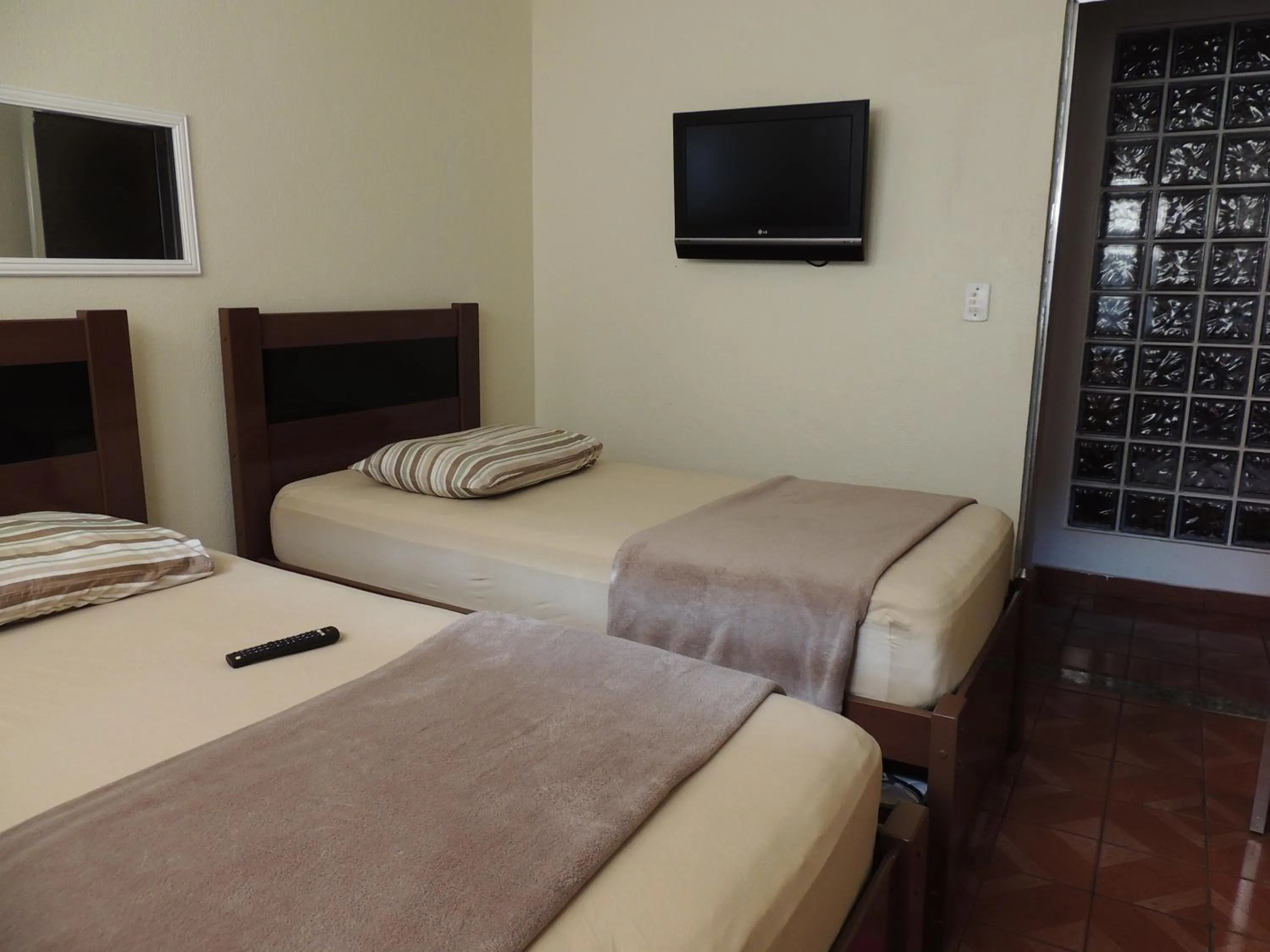 Bed in Quartos Em Casa In Caxias da Paraíso