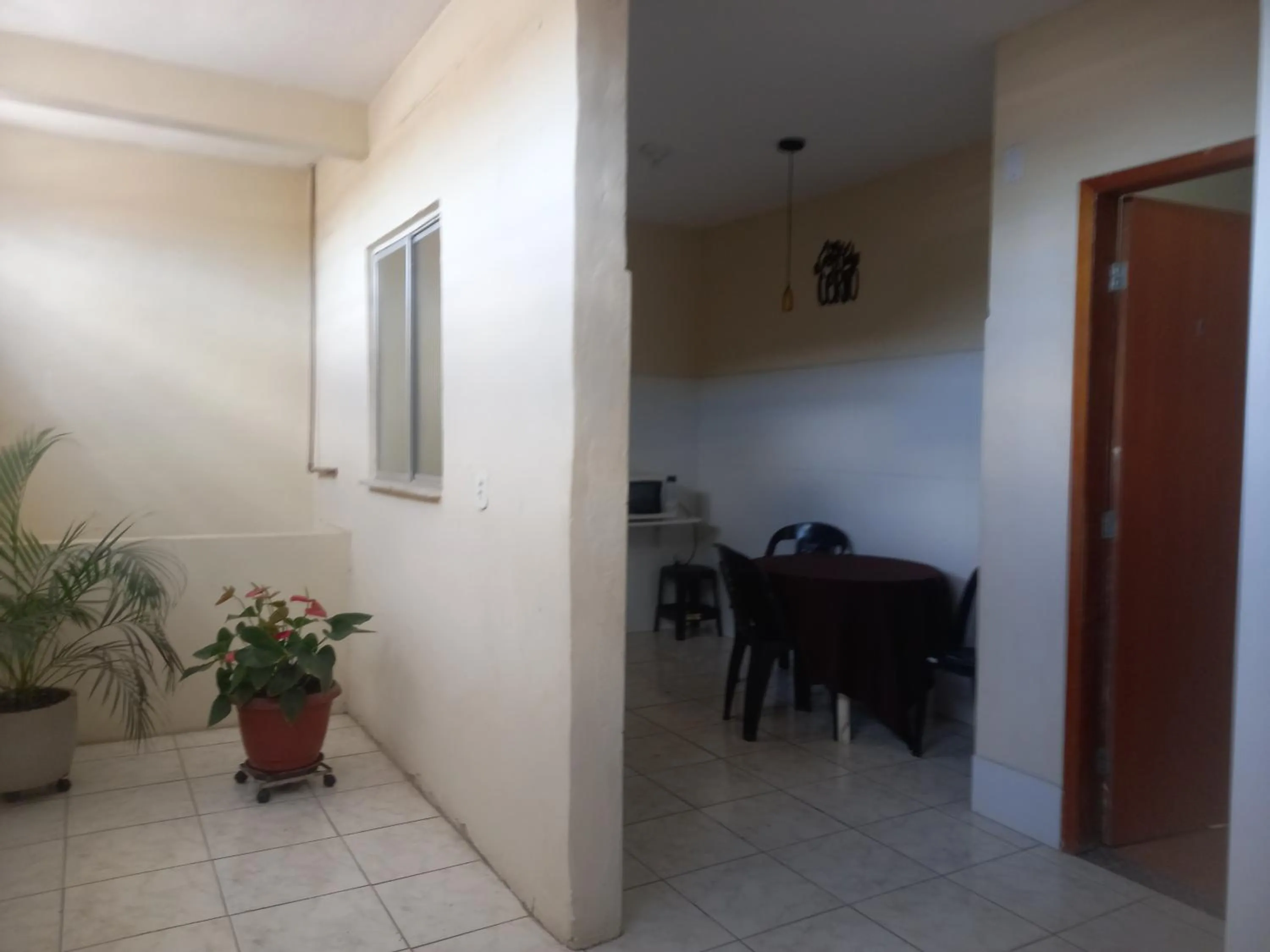 Garden view in Quartos Em Casa In Caxias da Paraíso