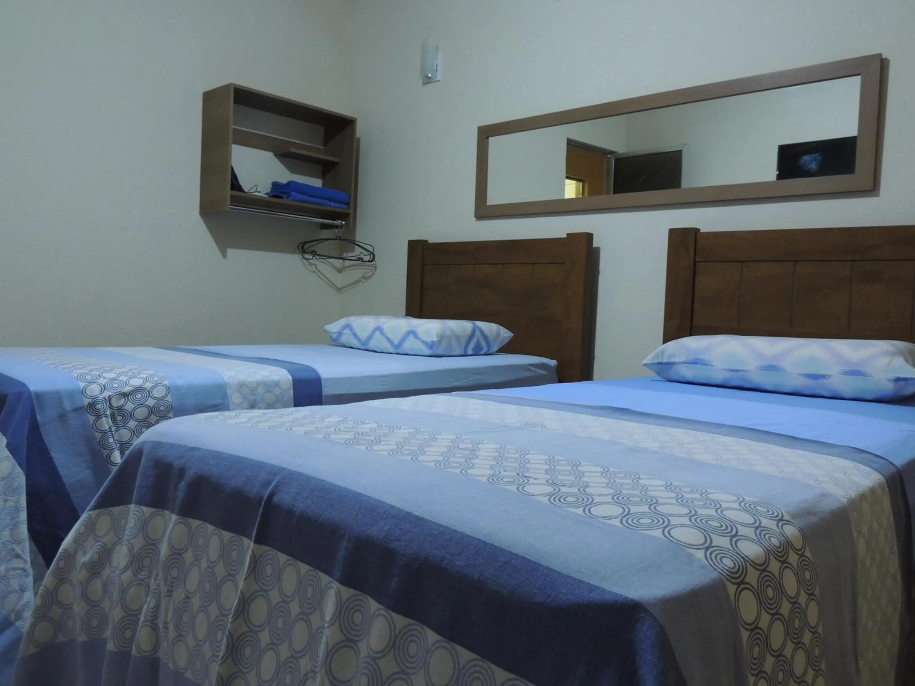 Bed in Quartos Em Casa In Caxias da Paraíso
