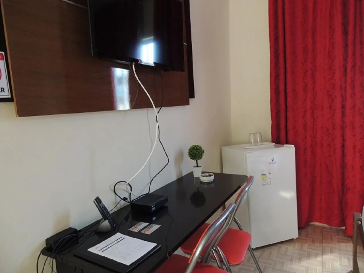 TV and multimedia in Quartos Em Casa In Caxias da Paraíso