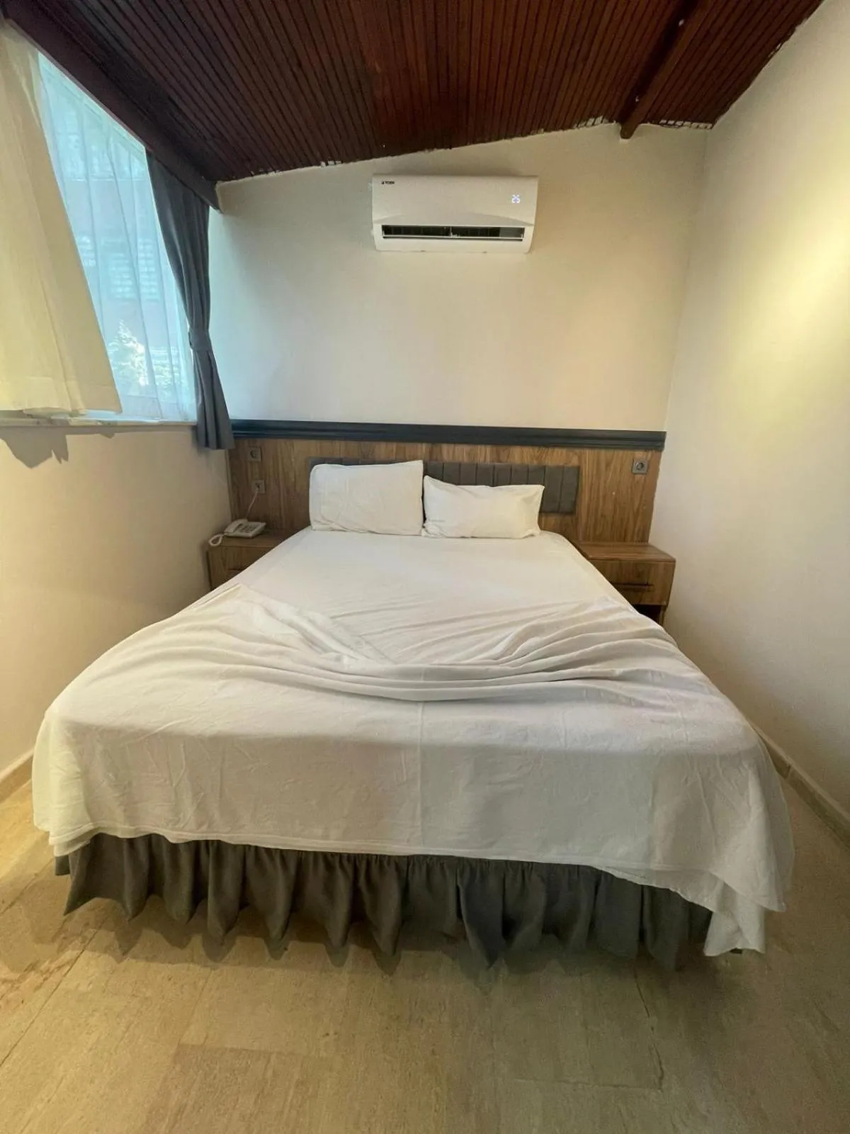 Bed in Grand Lavin Hotel