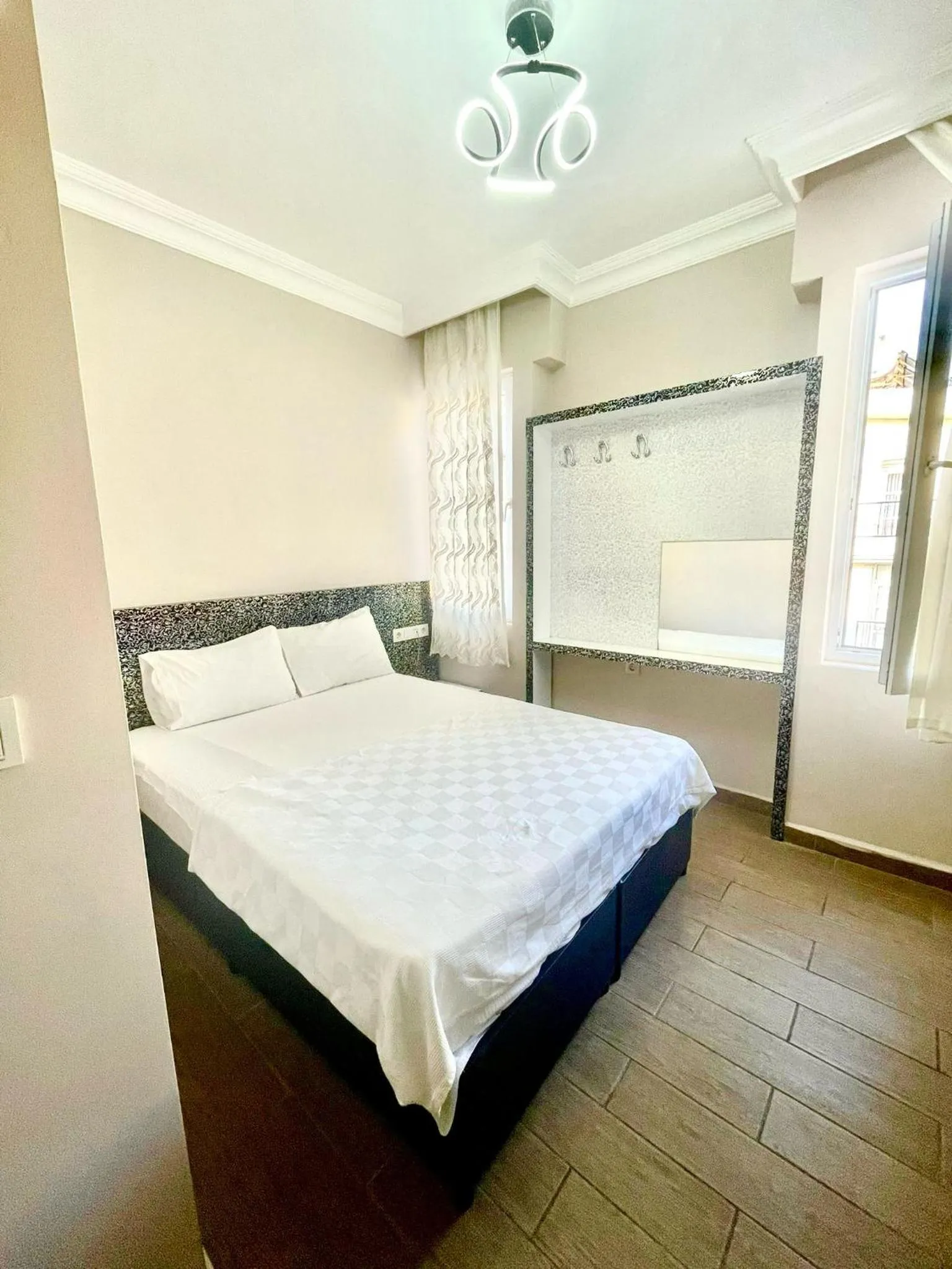 Bed in Grand Lavin Hotel