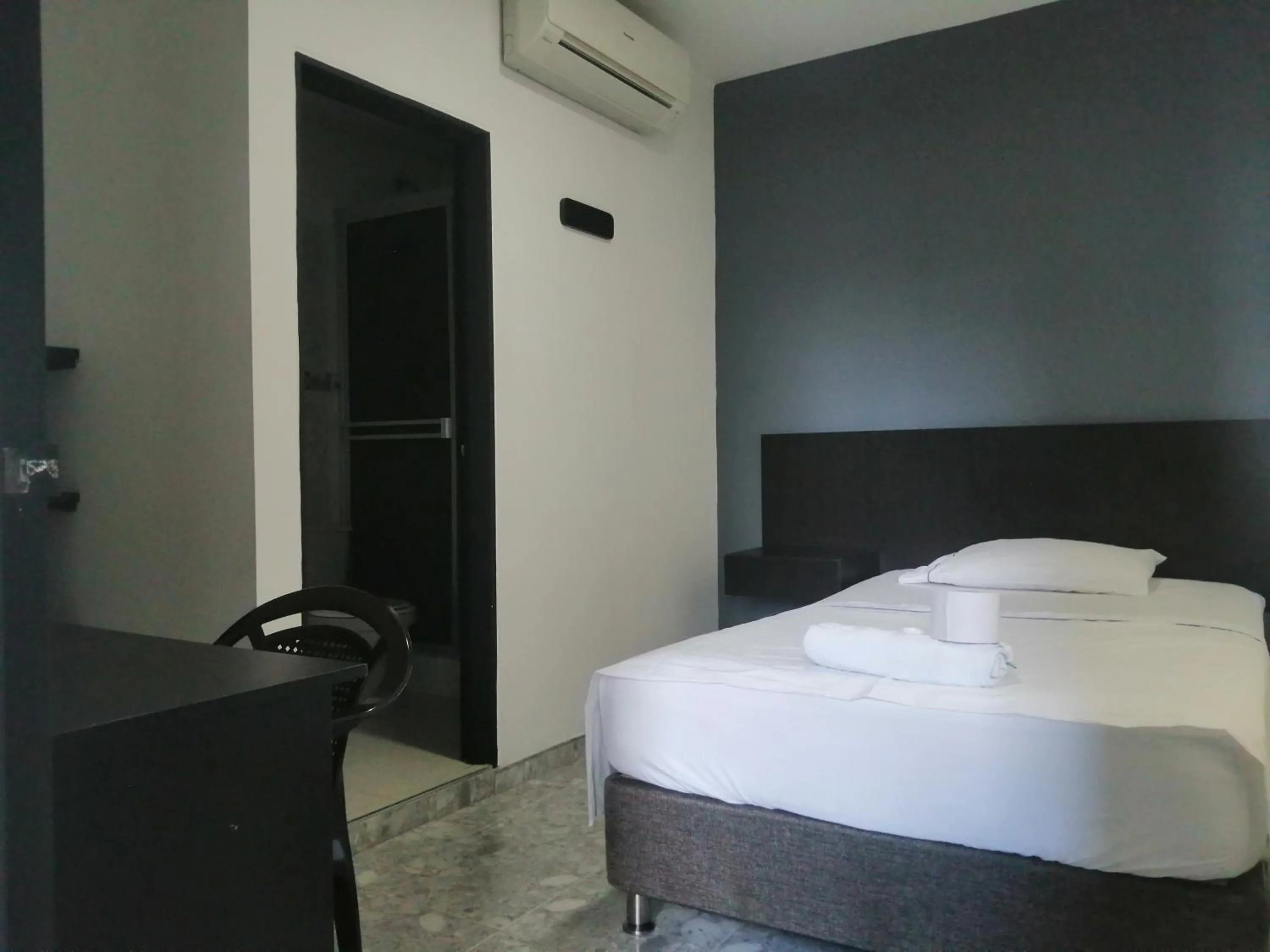 Bed in Hotel Bucare