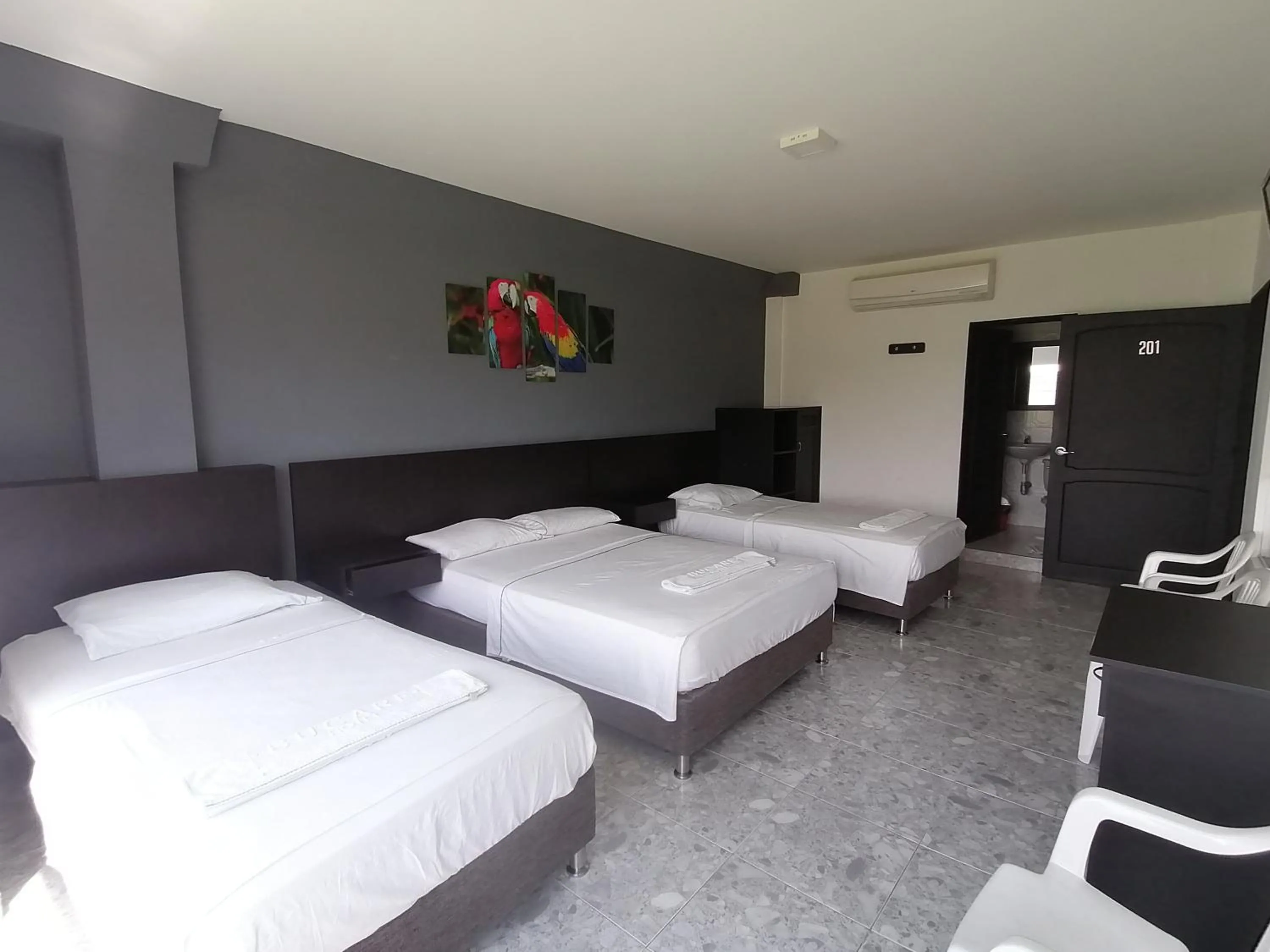 Bed in Hotel Bucare