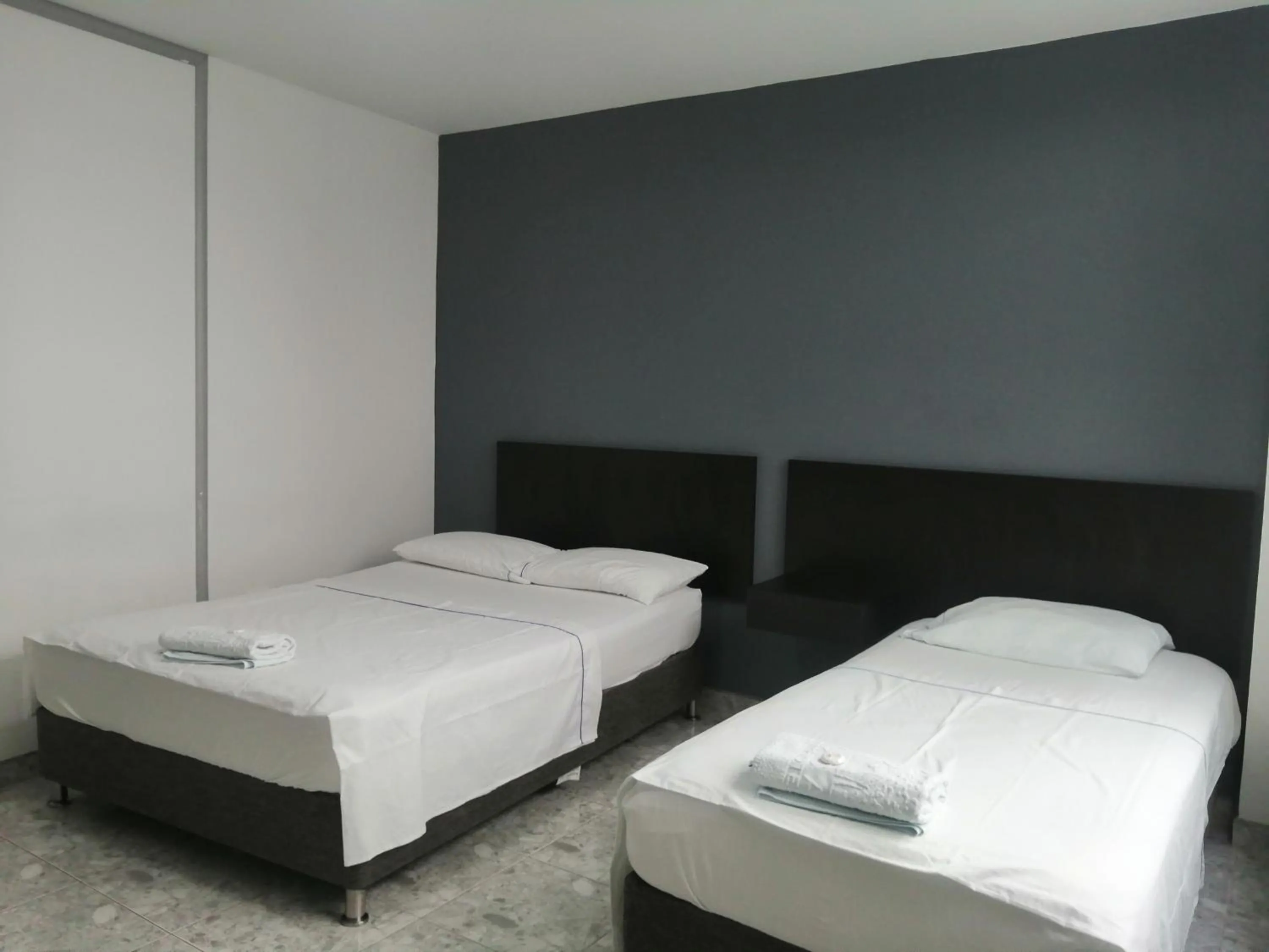 Bed in Hotel Bucare