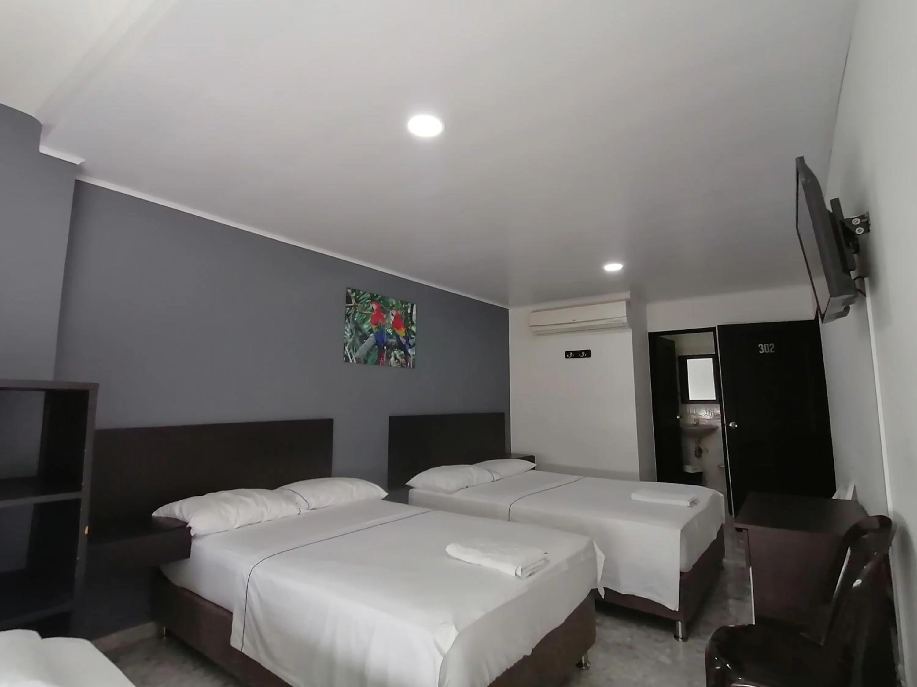 air conditioner, Bed in Hotel Bucare